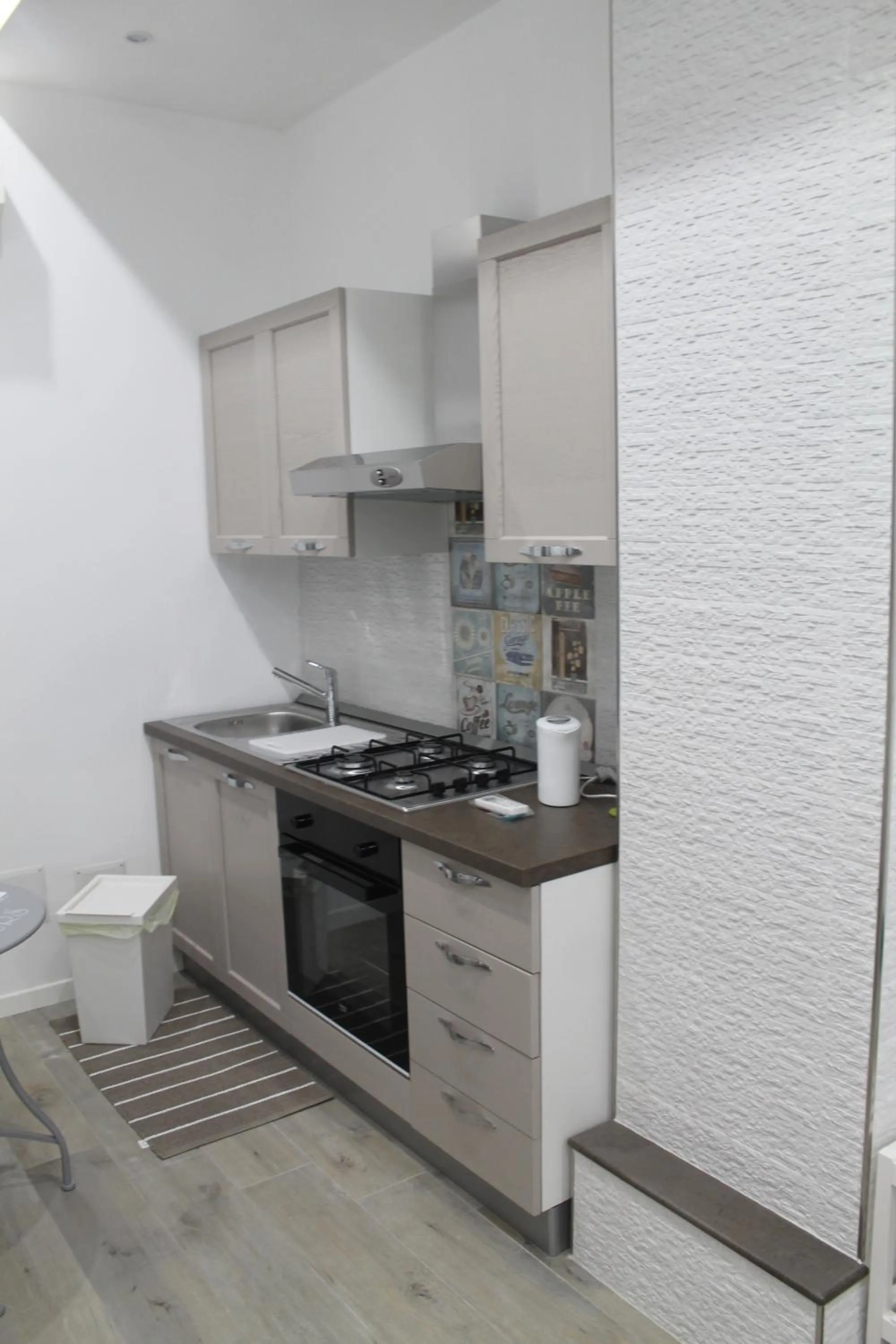 Kitchen or kitchenette in Vacanze HOME