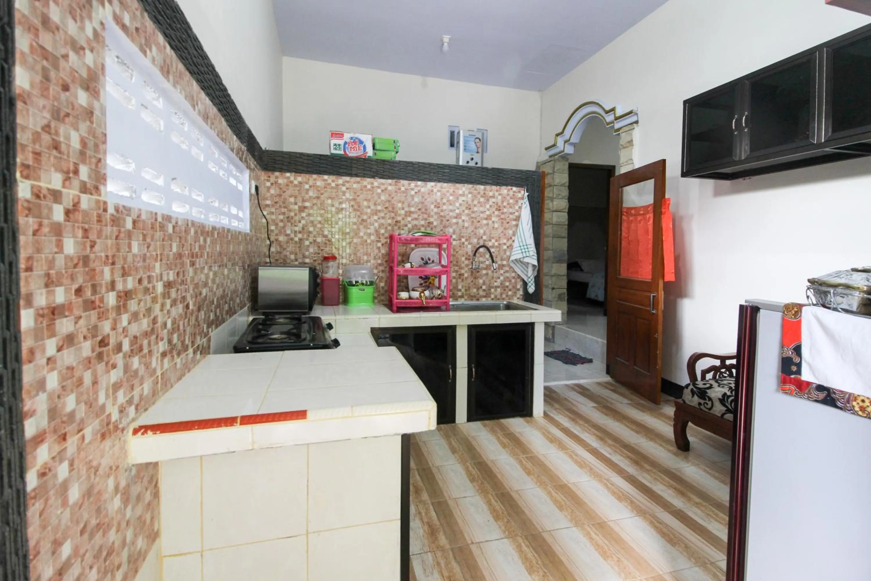 Kitchen or kitchenette in RedDoorz near Museum Gunung Merapi