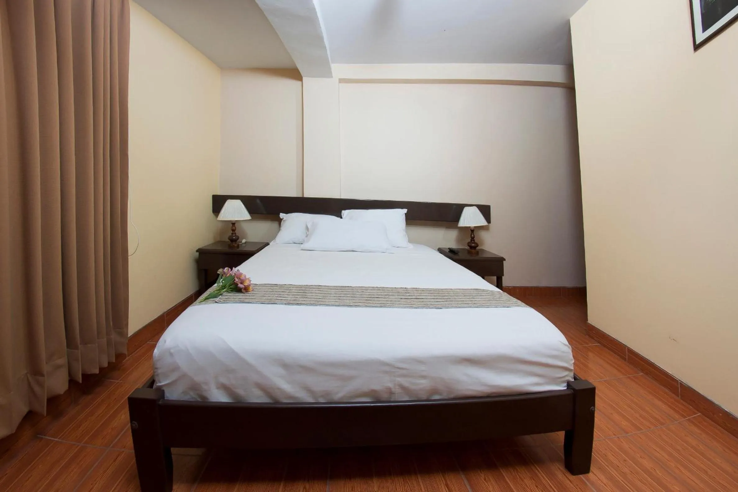Bedroom in Yucay Plaza Inn