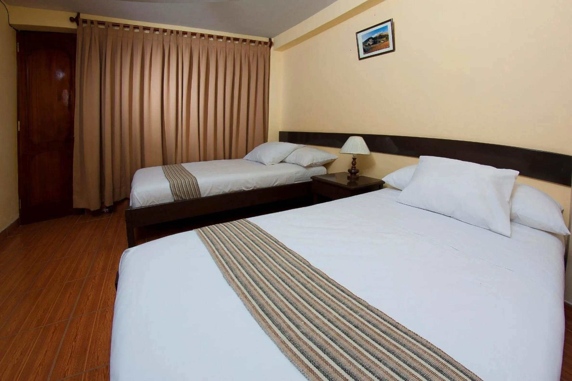 Bedroom in Yucay Plaza Inn