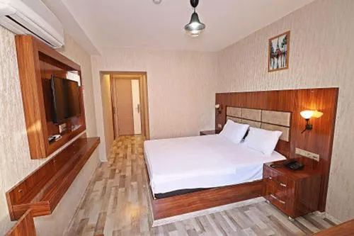Bed in MARİNA HOTEL