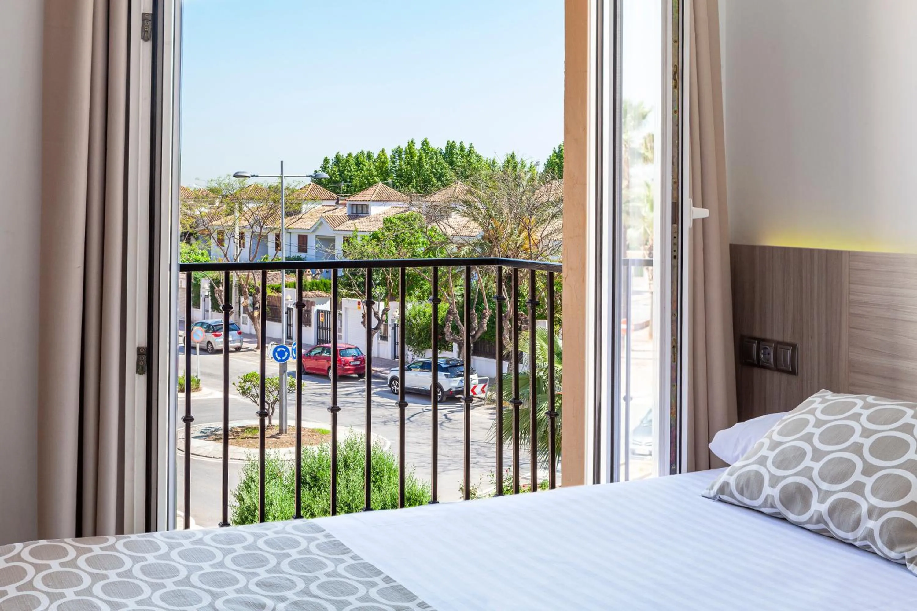 View (from property/room), Bed in Hotel Olympia Ronda II