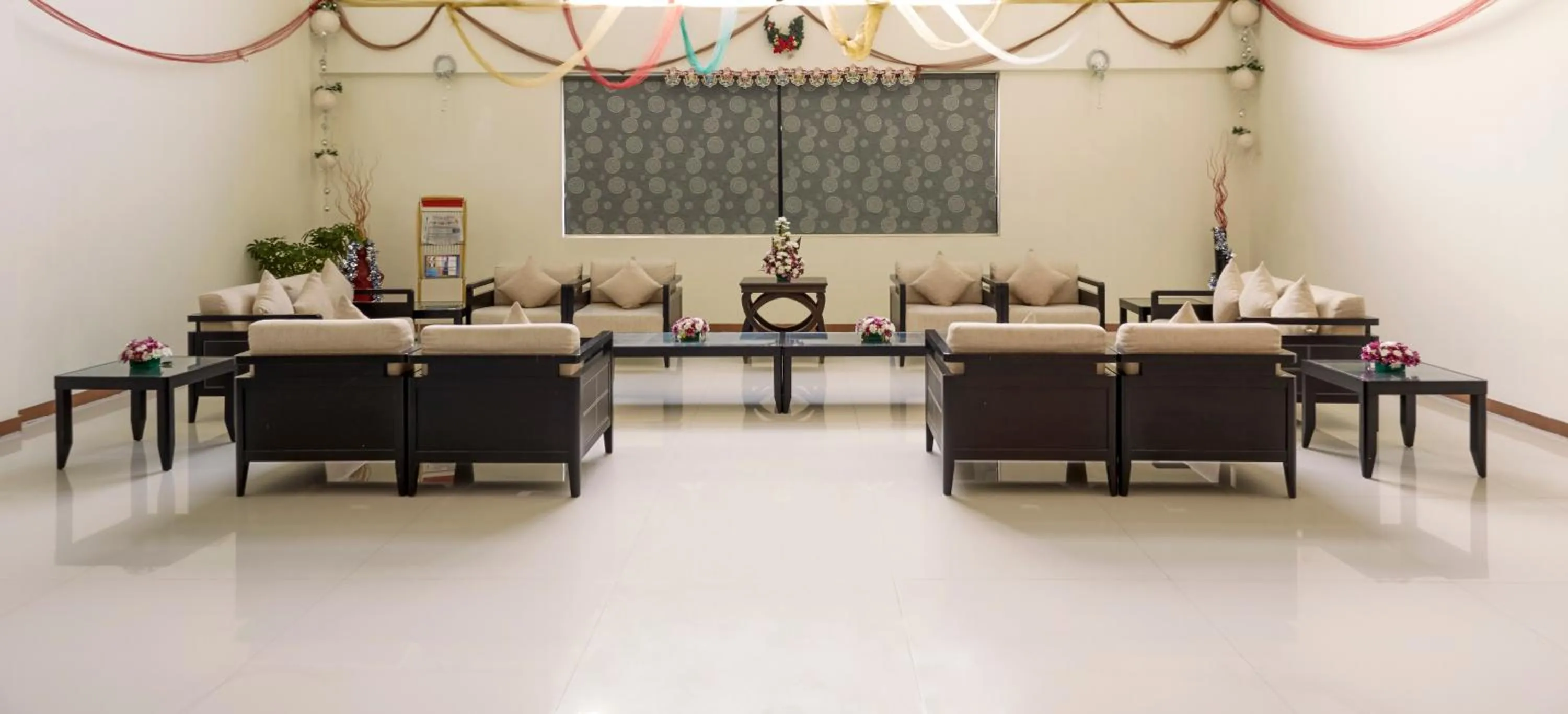 Communal lounge/ TV room in JP Chennai Hotel