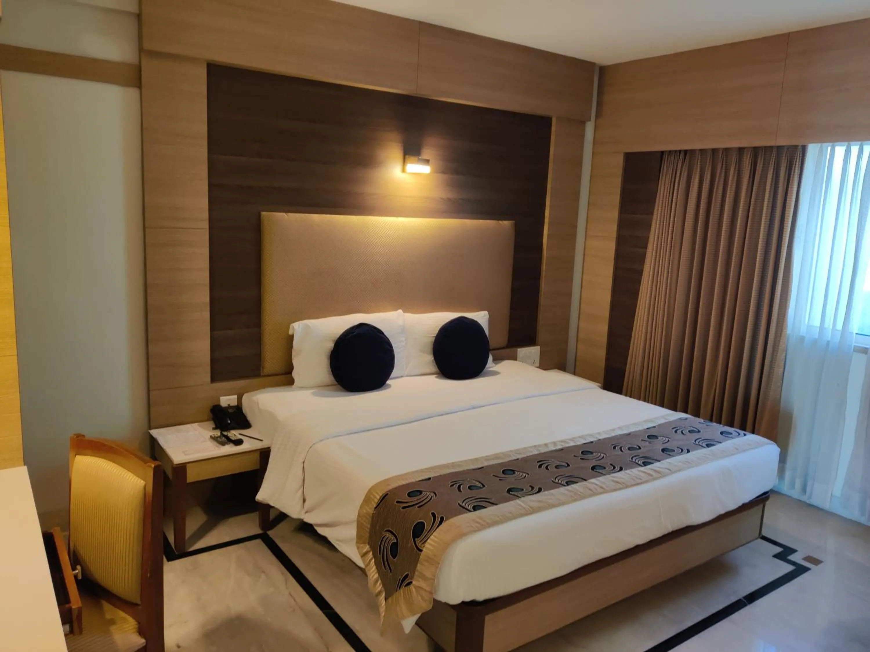 Bed in JP Chennai Hotel