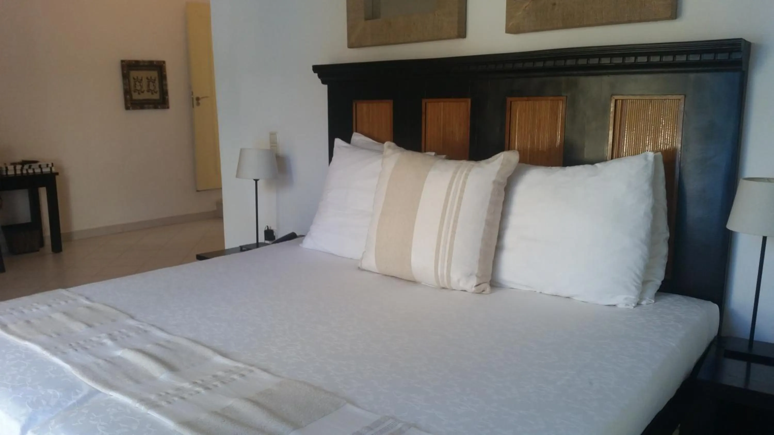 Bed in Coco Ocean Resort & Spa