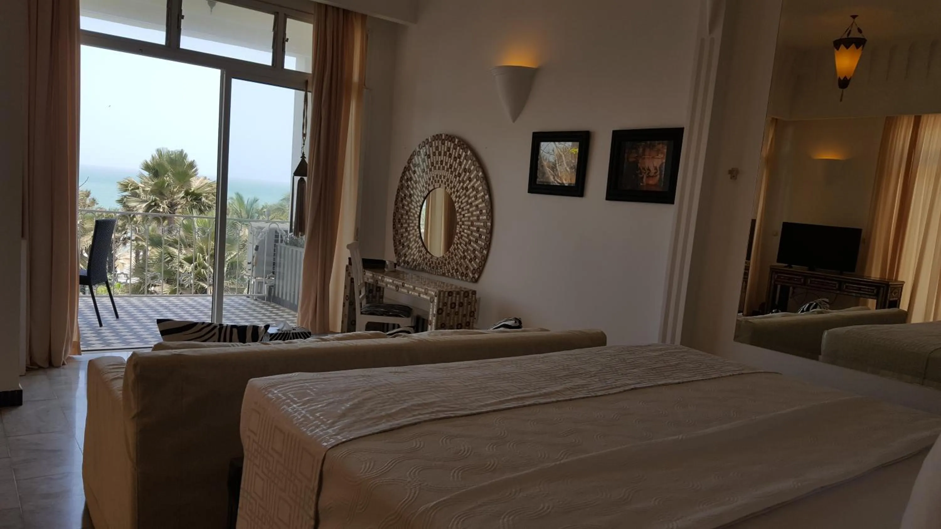 Bed in Coco Ocean Resort & Spa