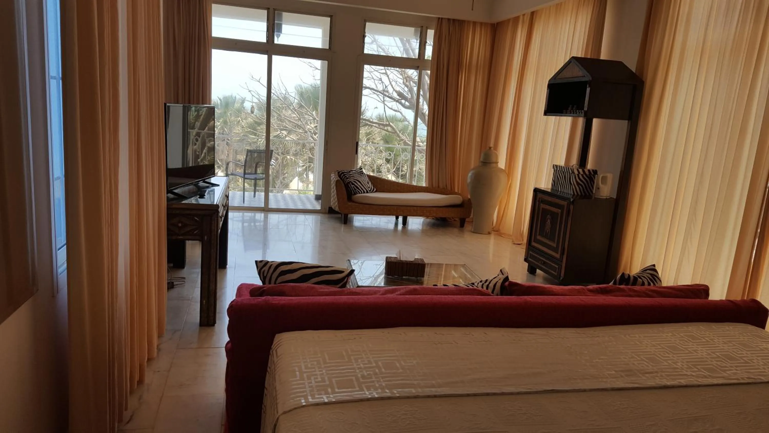 Bed in Coco Ocean Resort & Spa