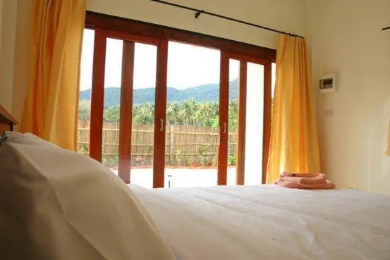 View (from property/room), Bed in Naga Peak Resort