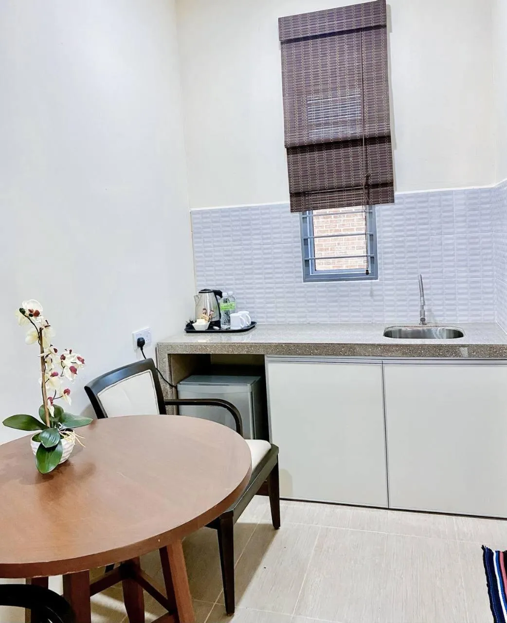 Kitchen or kitchenette in Padimas Villa @Datai Valley