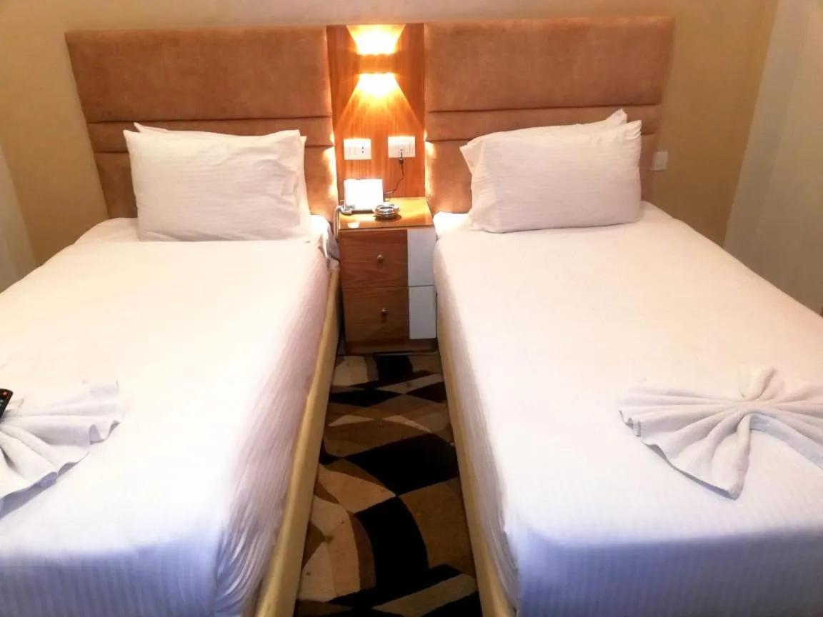 Bed in Jewel Al Nasr Hotel & Apartments