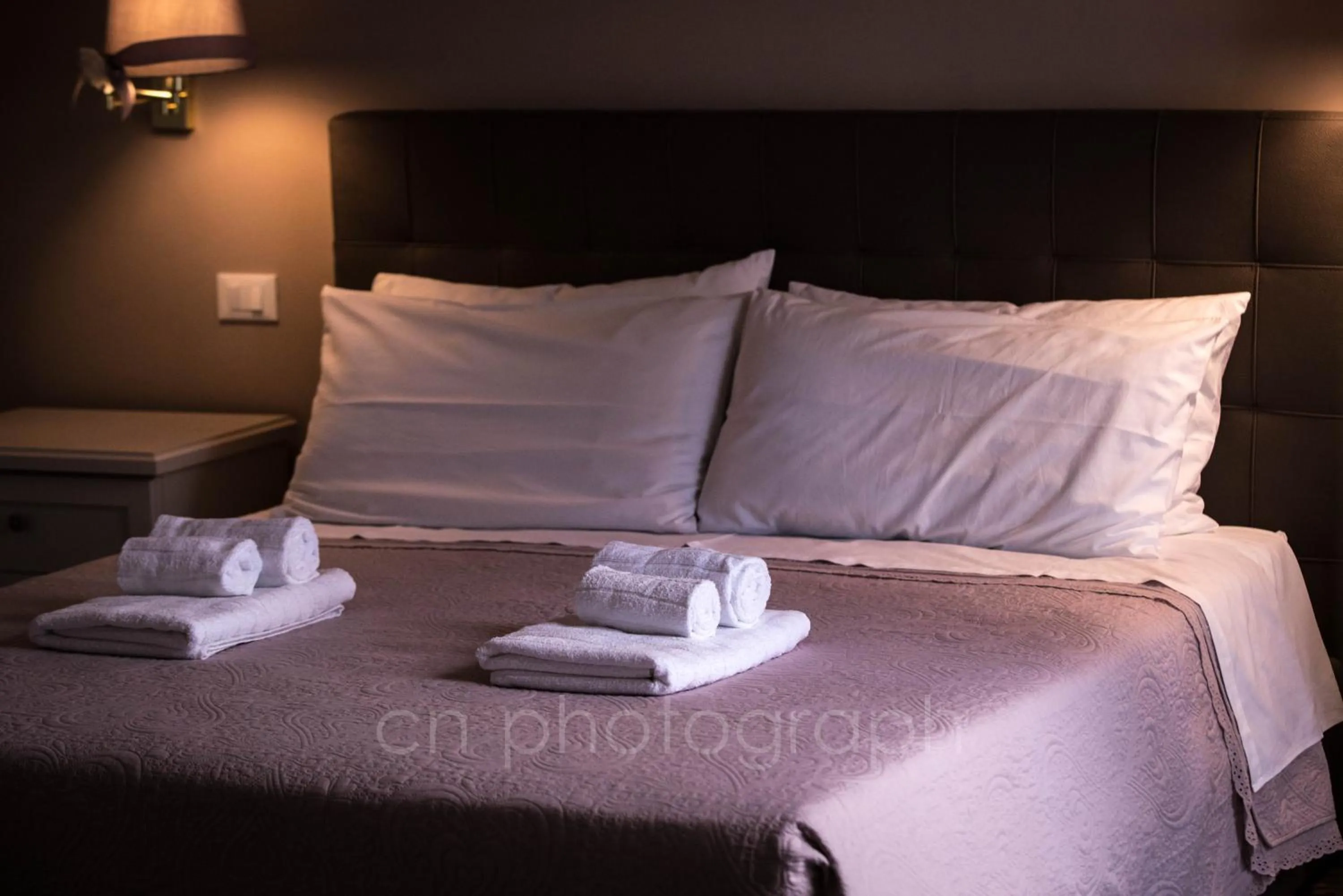 Bed in La Dimora del Falconiere - Luxury Suites