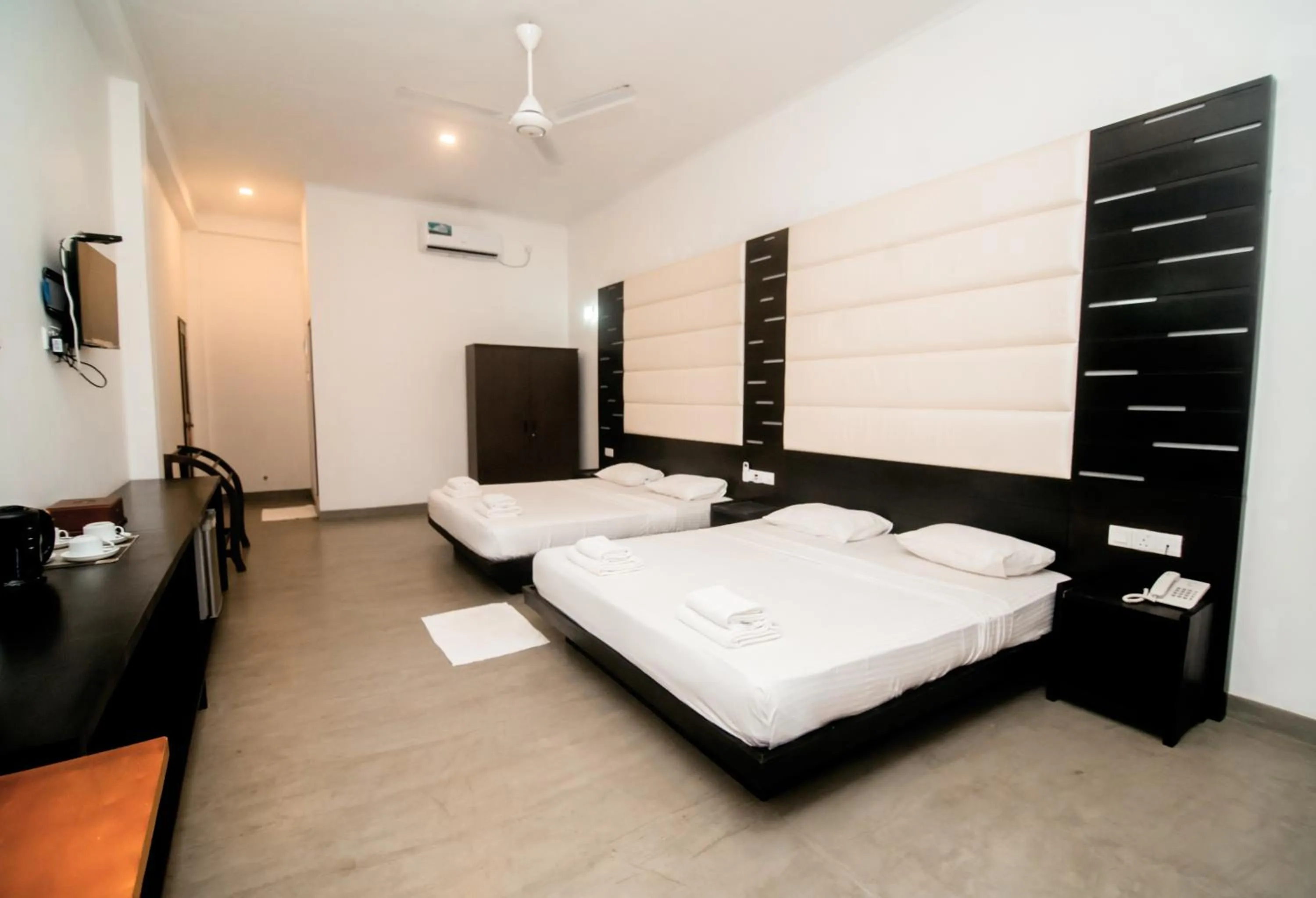 Bed in Lagoon Paradise Beach Resort