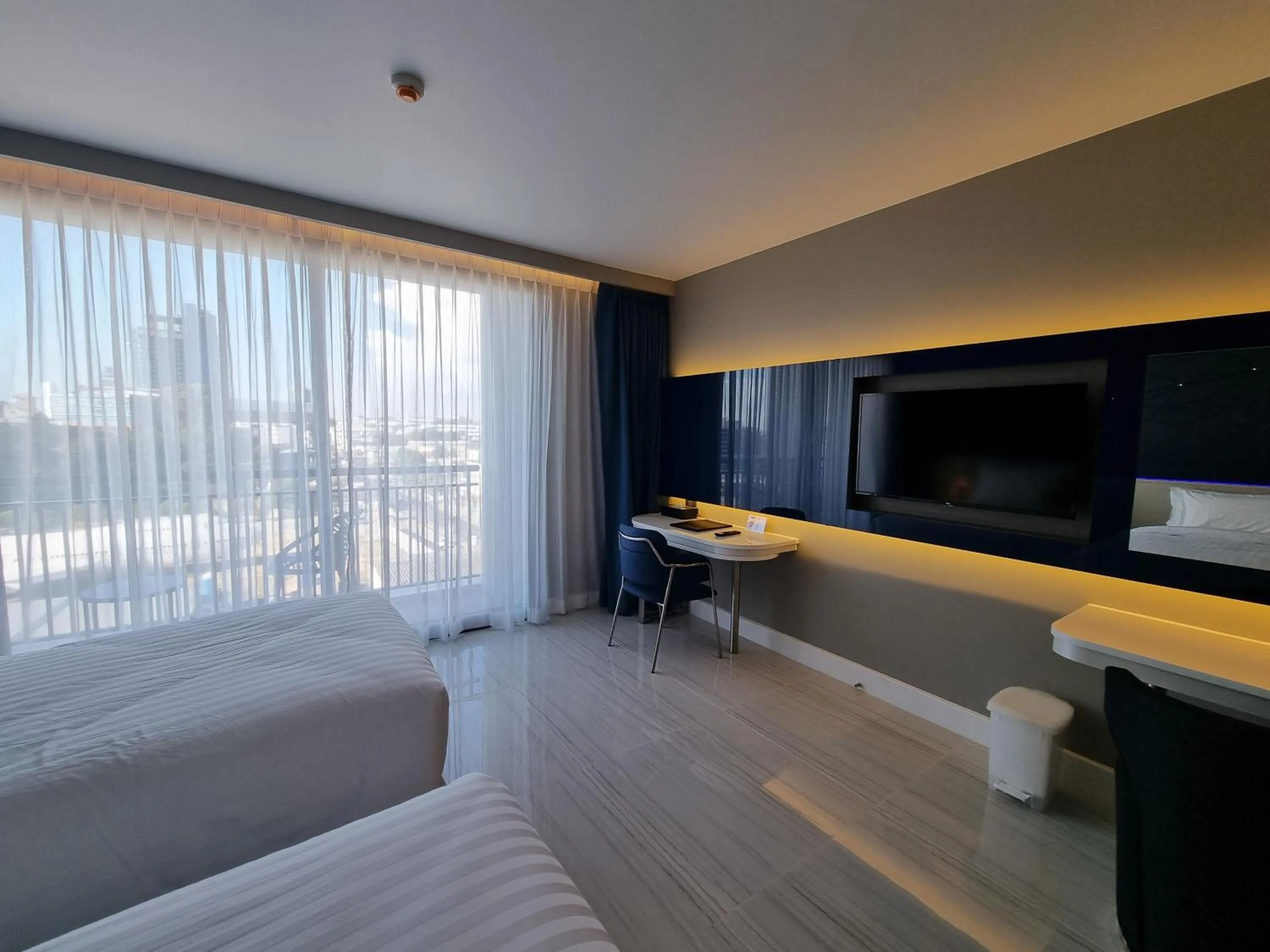 Bedroom, Bed in Pattaya Discovery Beach Hotel - SHA Extra Plus