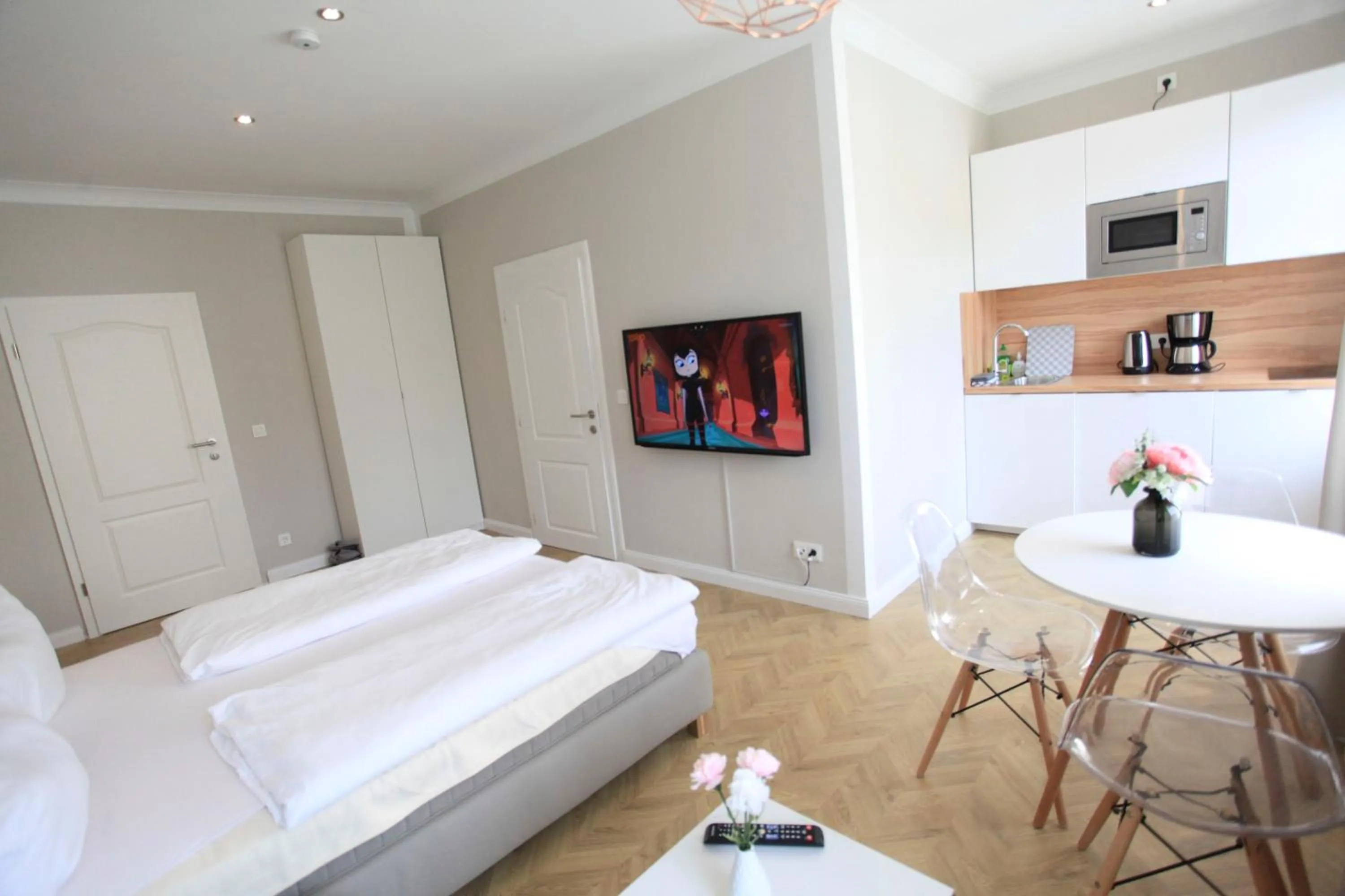 Coffee/tea facilities, Bed in Zollikof Aparts - Sauna & Studioapartments