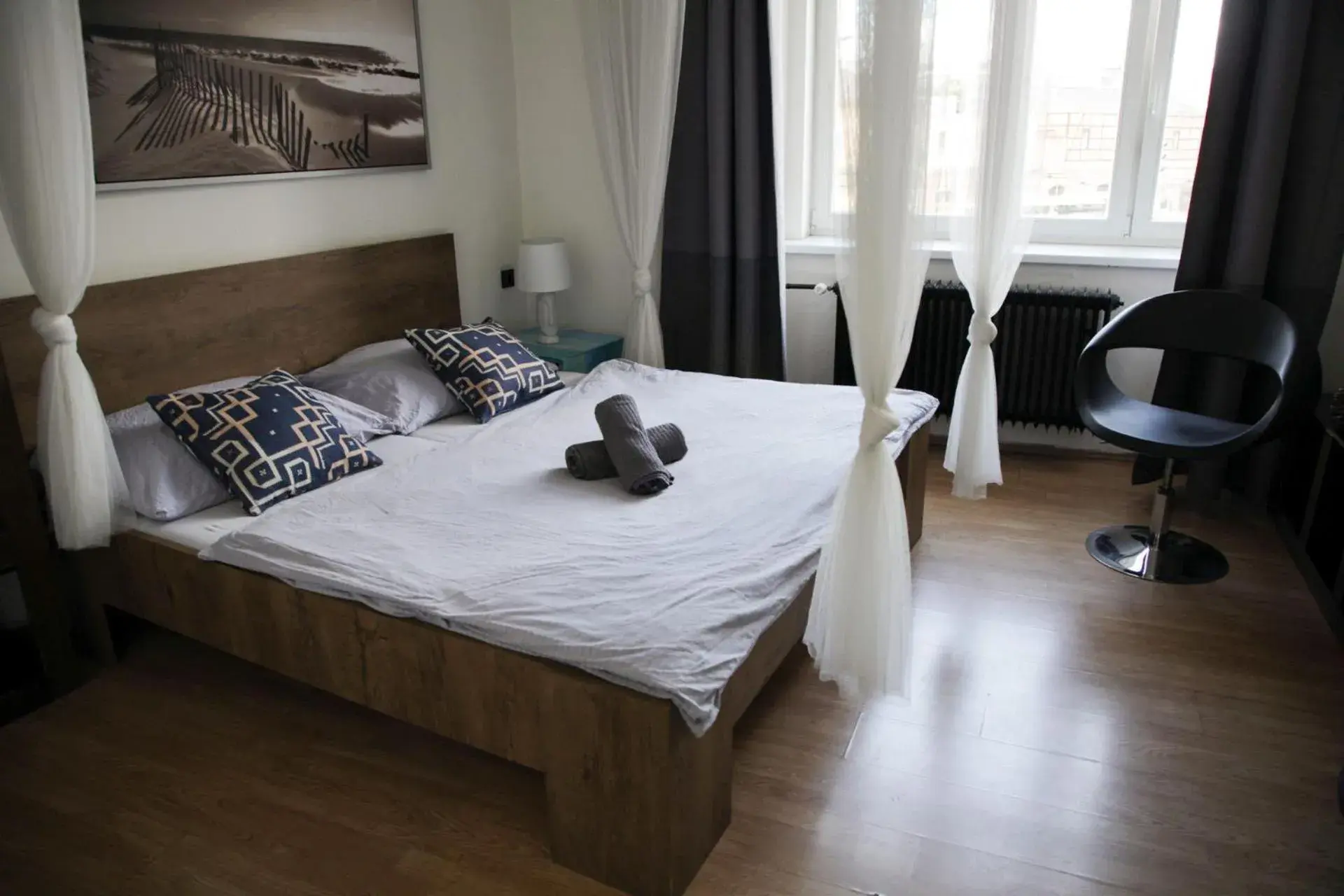 Double Room with Shared Bathroom in Wake Up Wellness Hostel by goodnite cz Double Room with Shared Bathroom in Wake Up Wellness Hostel by goodnite cz