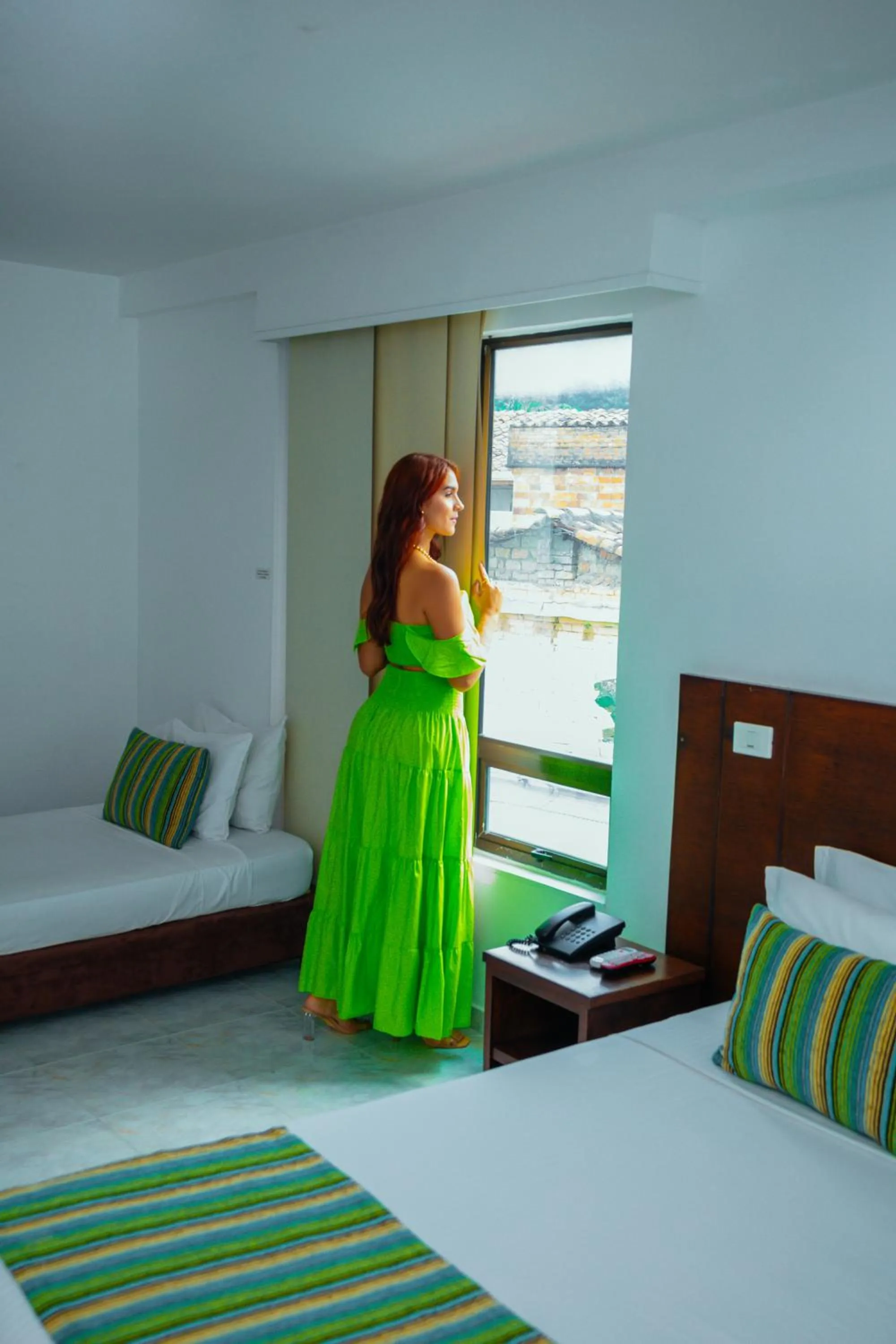 Bed in TAMA Hotel Granada Real Cali