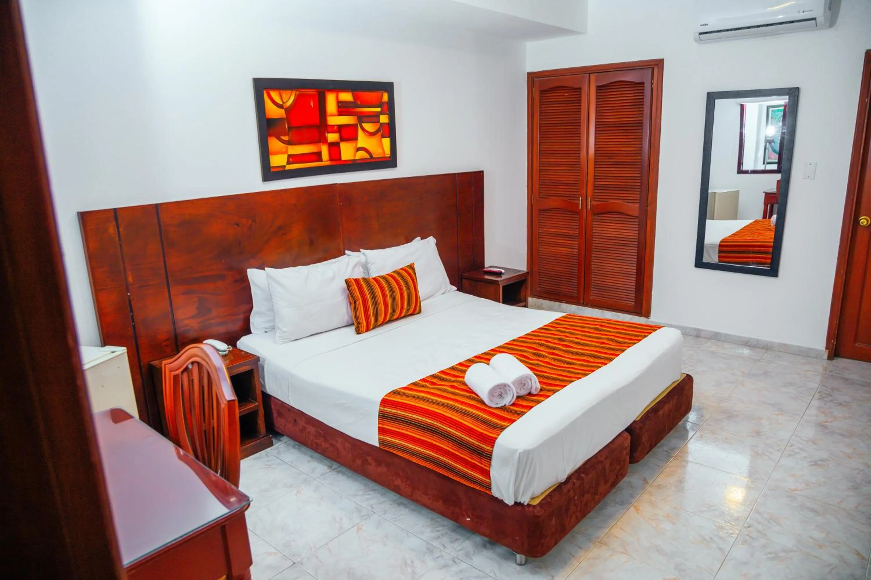 Bed in TAMA Hotel Granada Real Cali