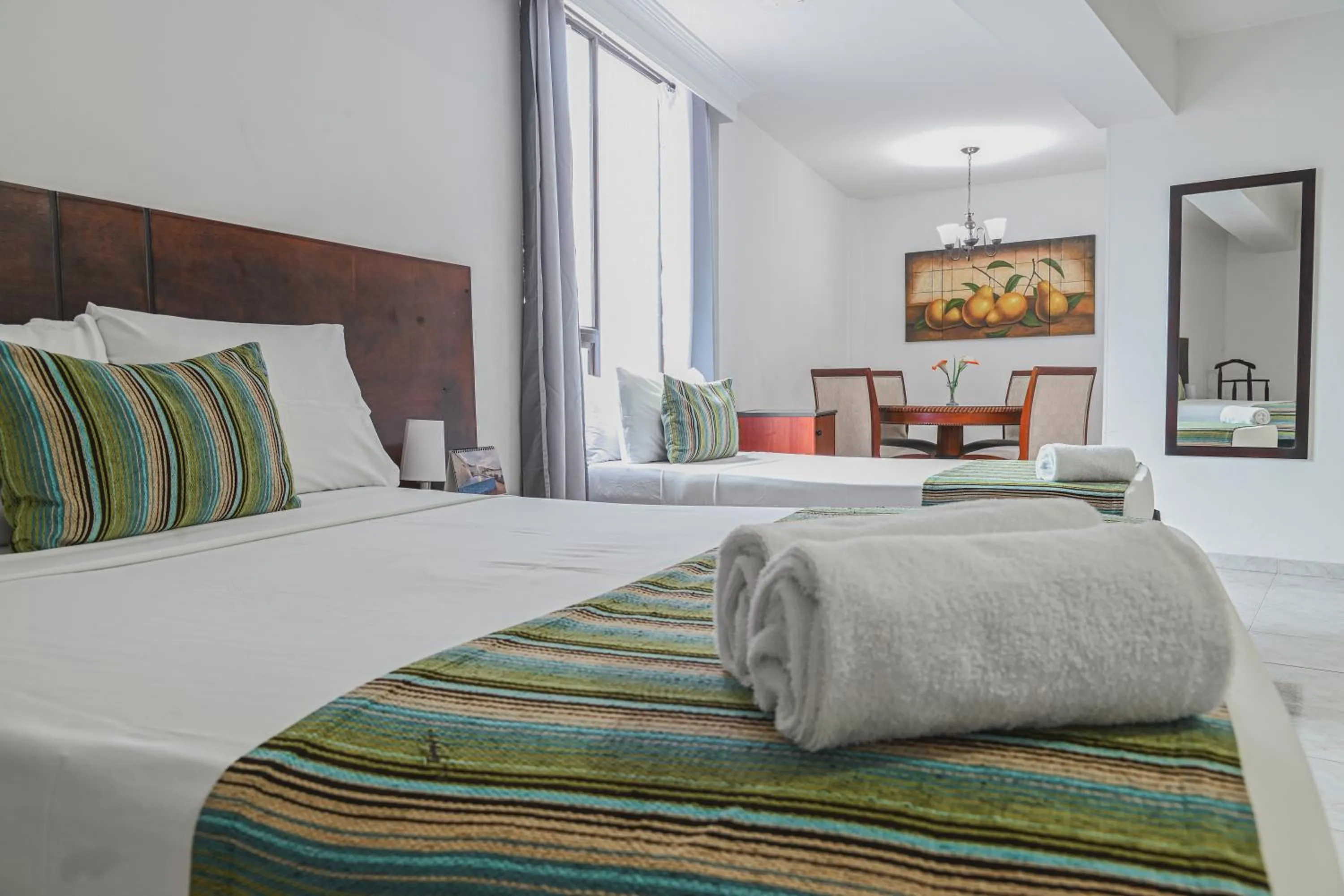 Decorative detail, Bed in TAMA Hotel Granada Real Cali