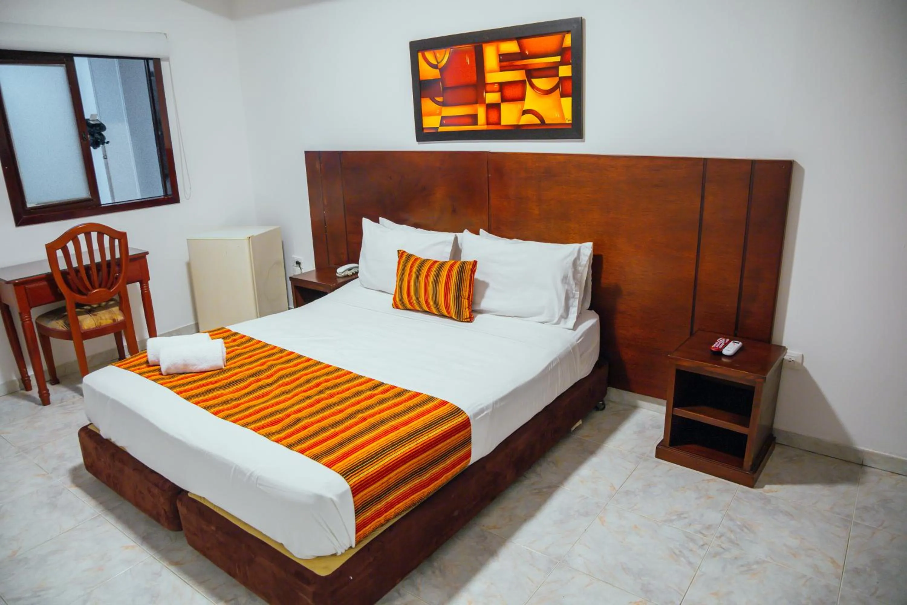 Bed in TAMA Hotel Granada Real Cali