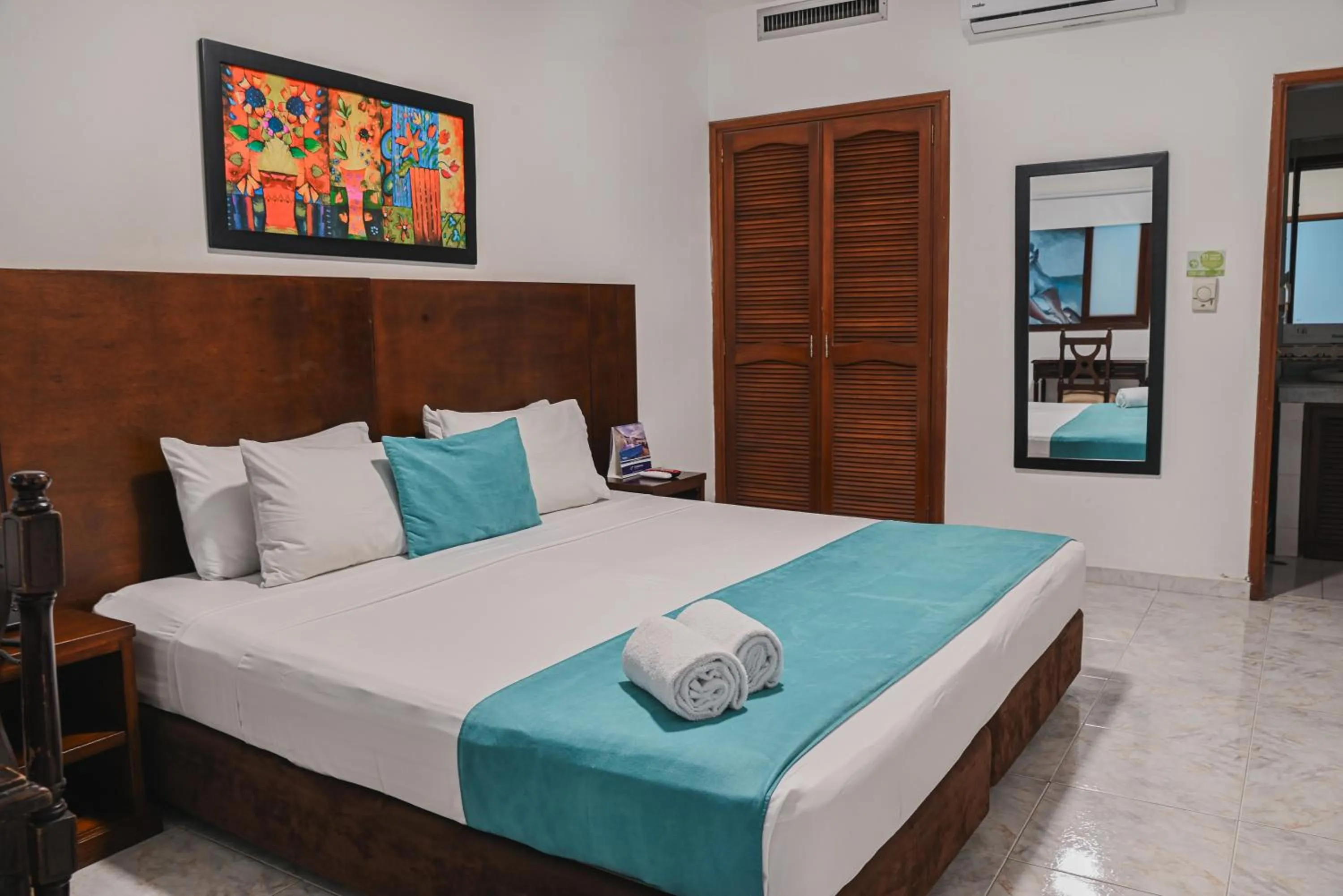 Bedroom, Bed in TAMA Hotel Granada Real Cali