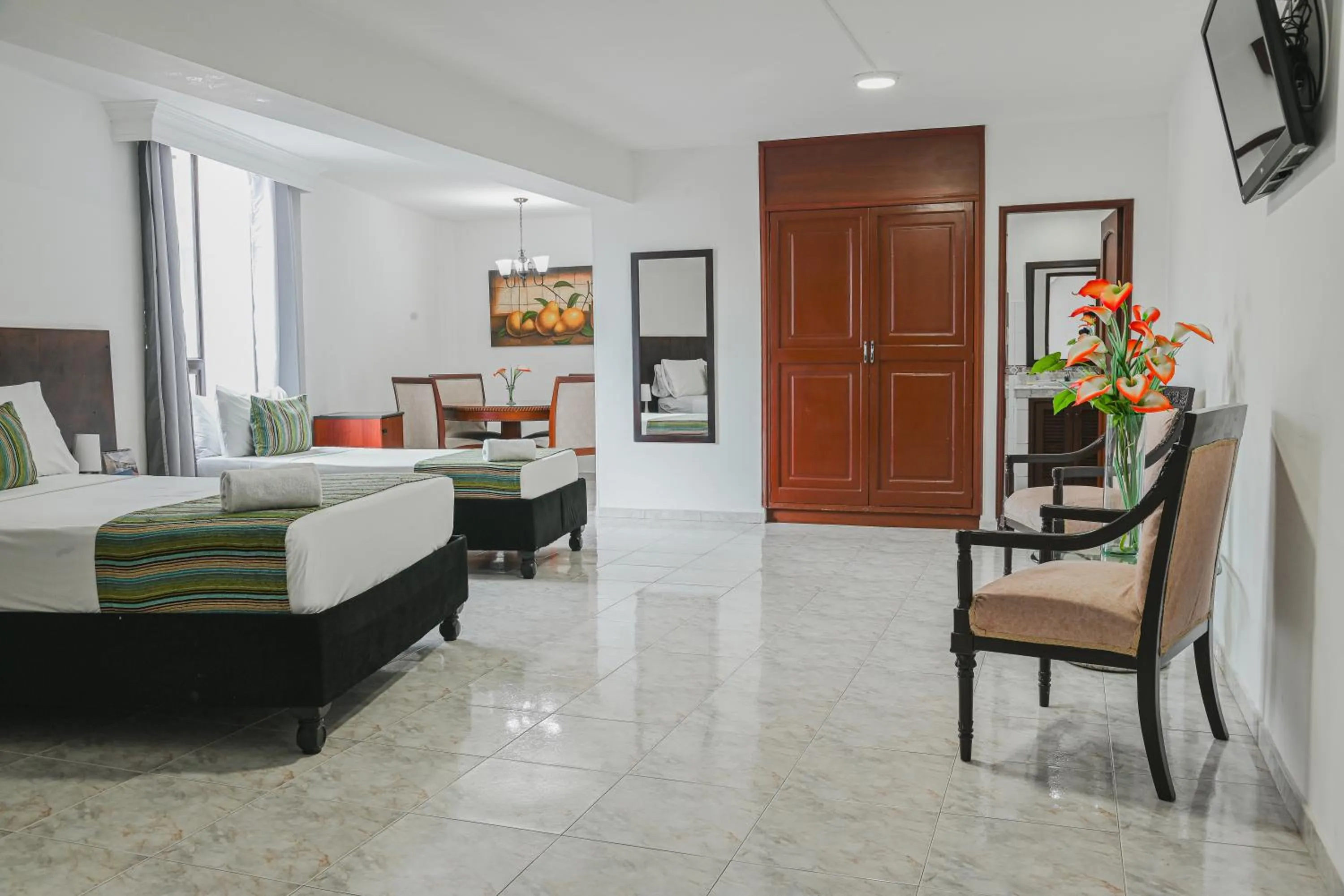 Photo of the whole room, Bed in TAMA Hotel Granada Real Cali