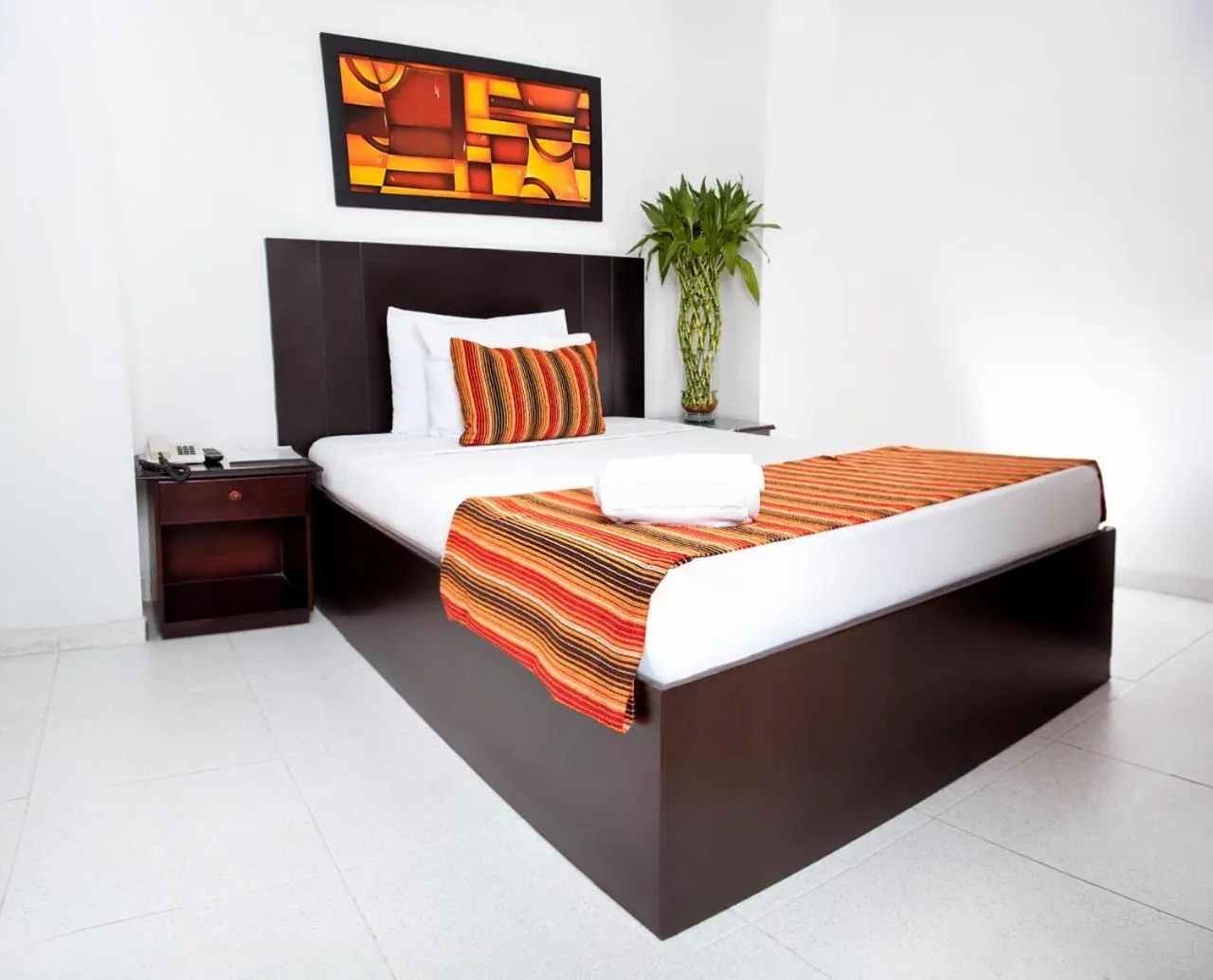 Bed in TAMA Hotel Granada Real Cali