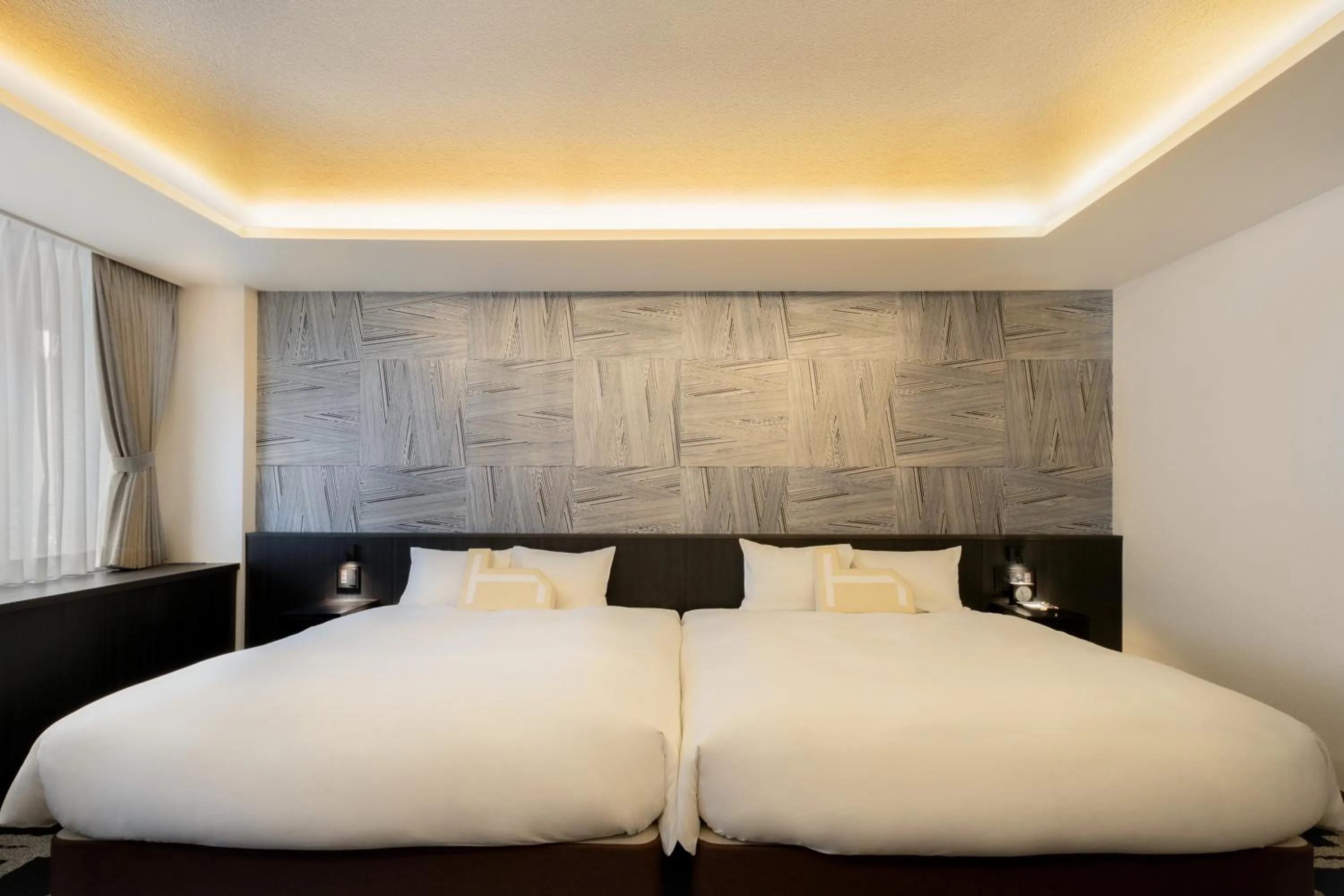 Bed in Homm Stay Nagi Sanjo Kyoto By Banyan Group