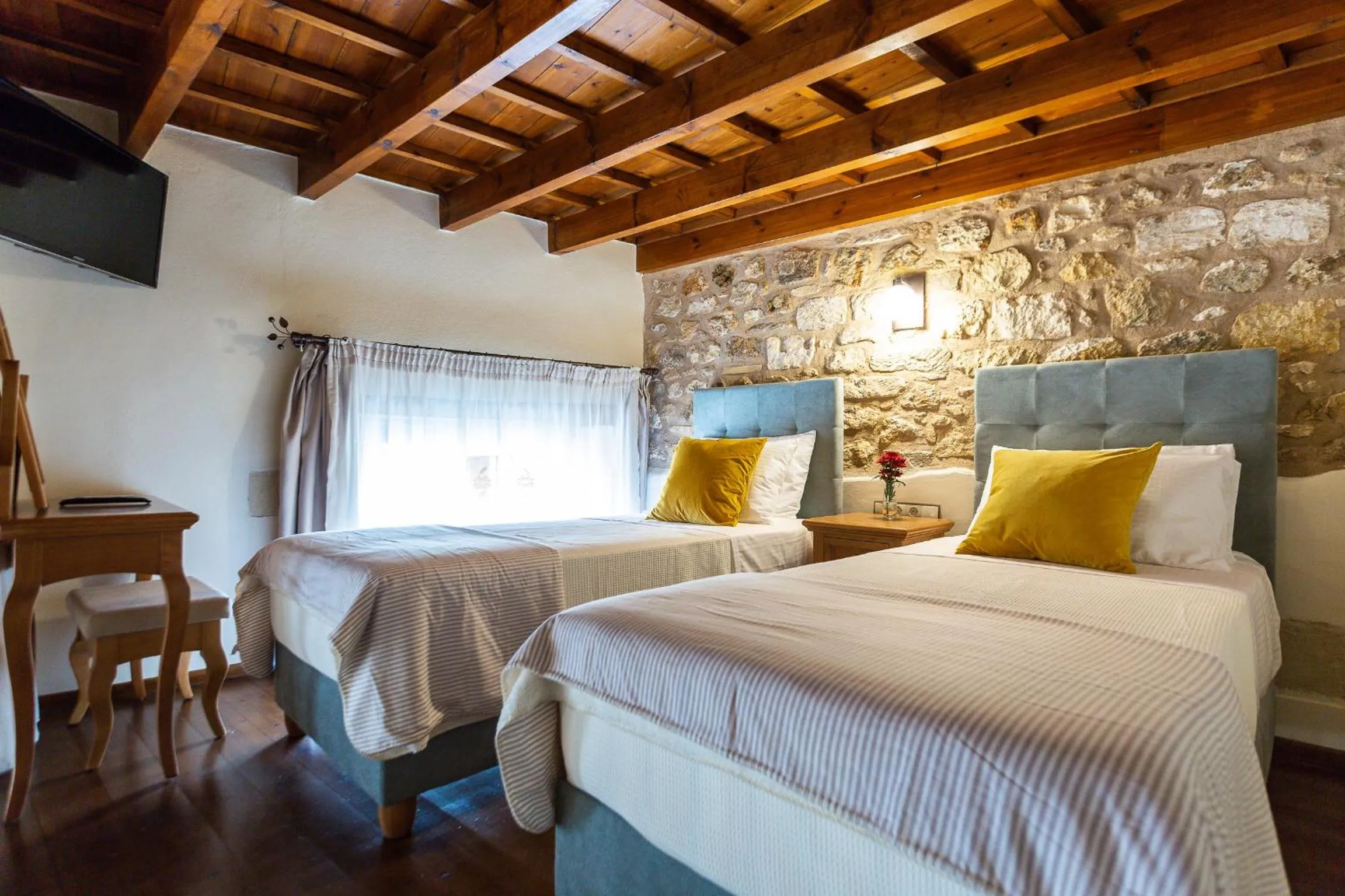 Bed in Phaedra Suites