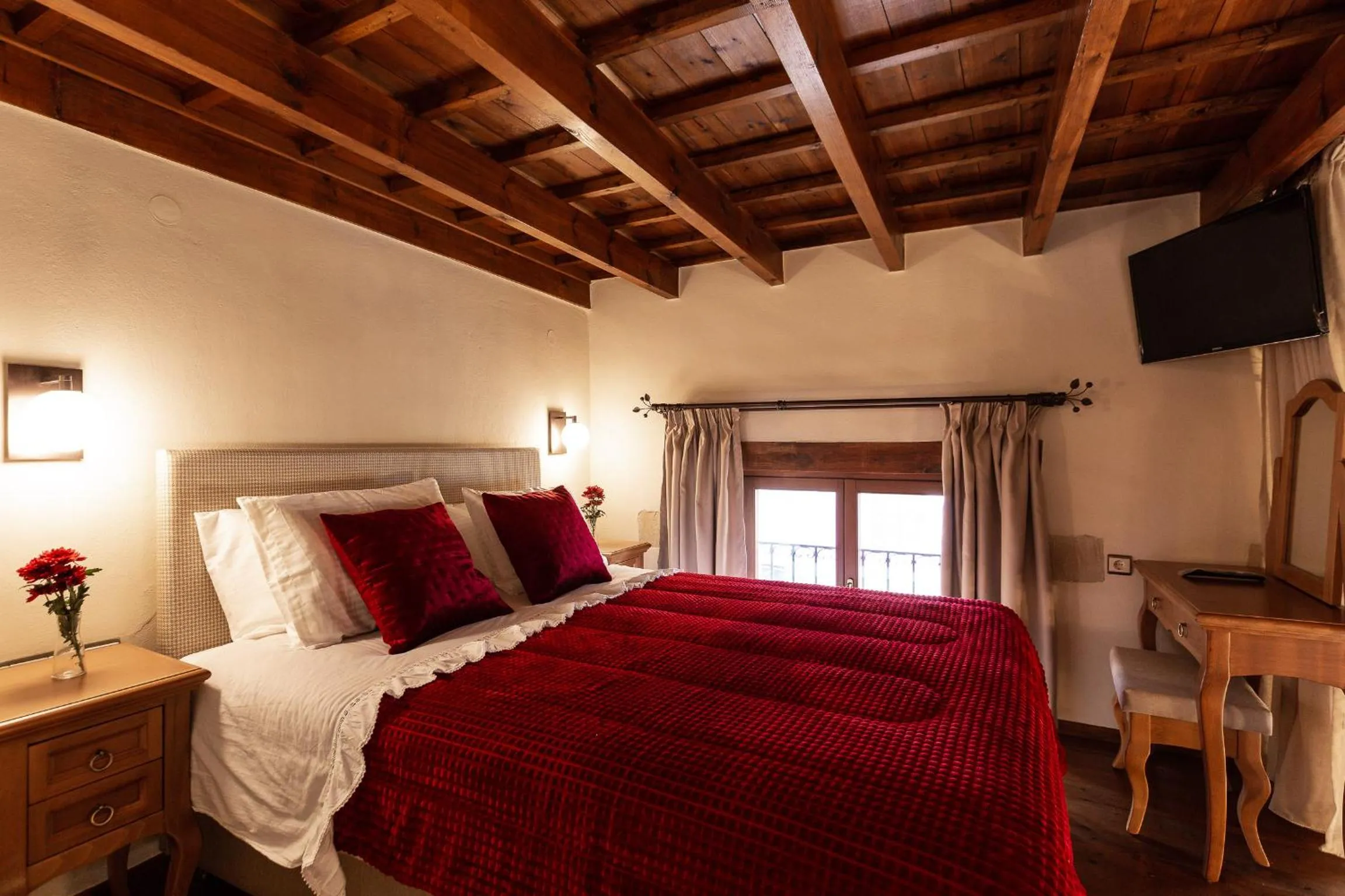 Bed in Phaedra Suites