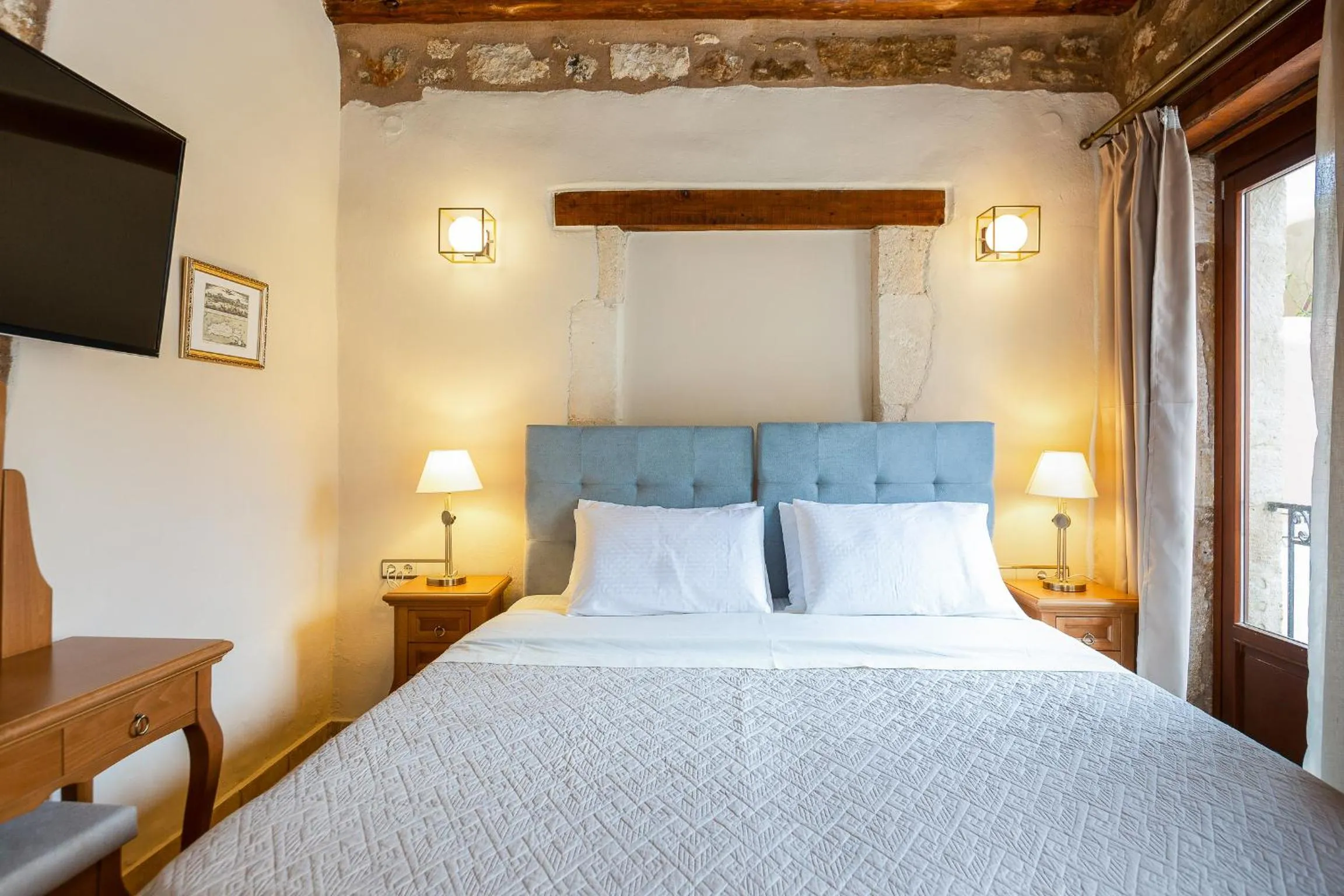 Bed in Phaedra Suites