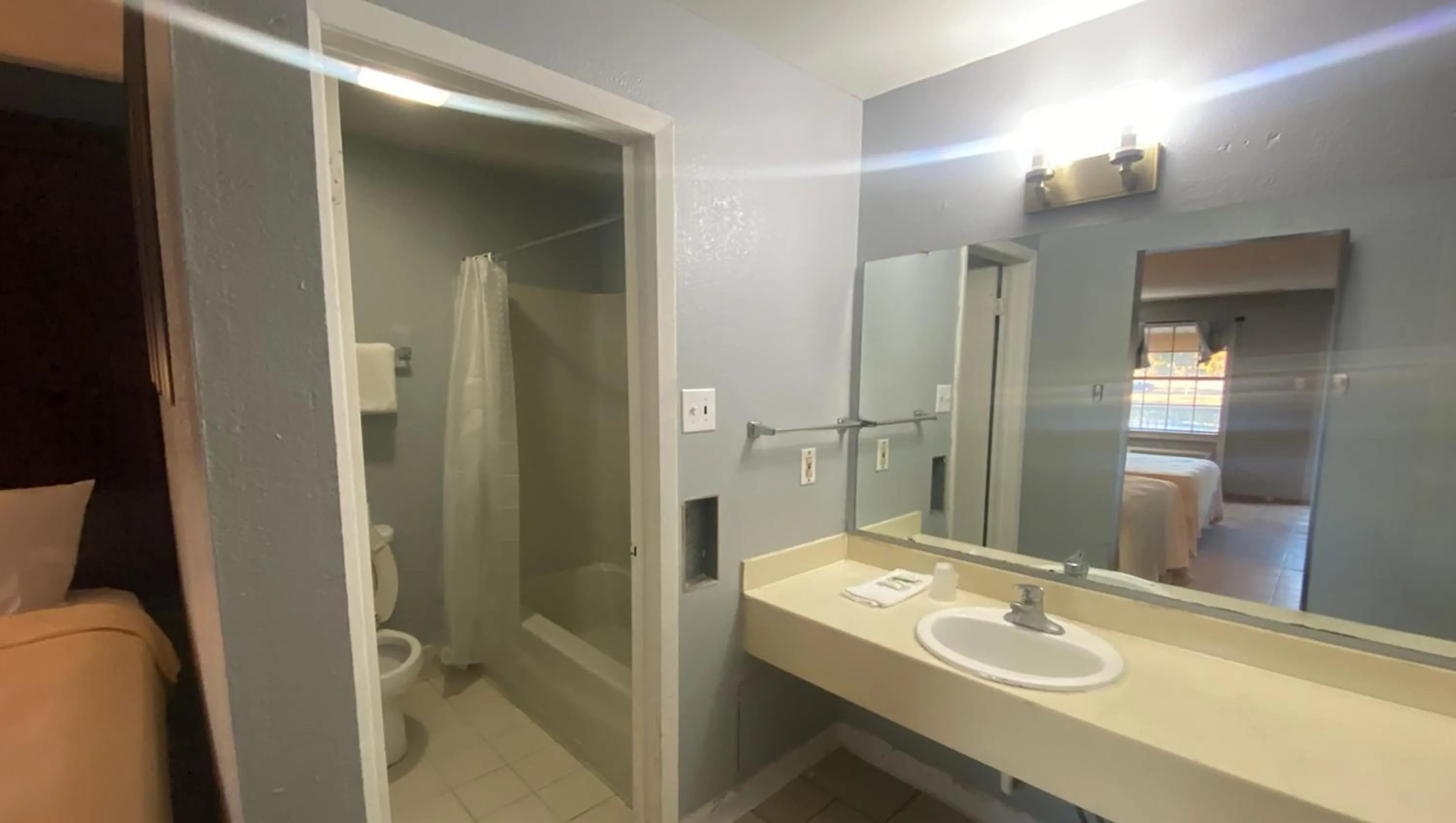 Bathroom in Magnuson Hotel Little Rock South