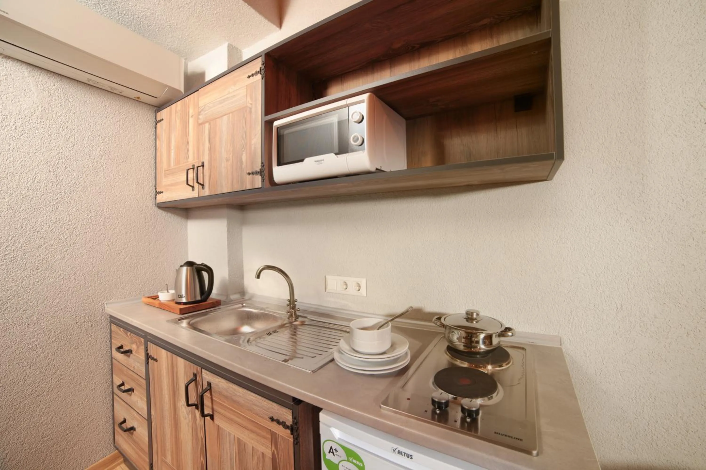 Kitchen or kitchenette in Ardilas Residence