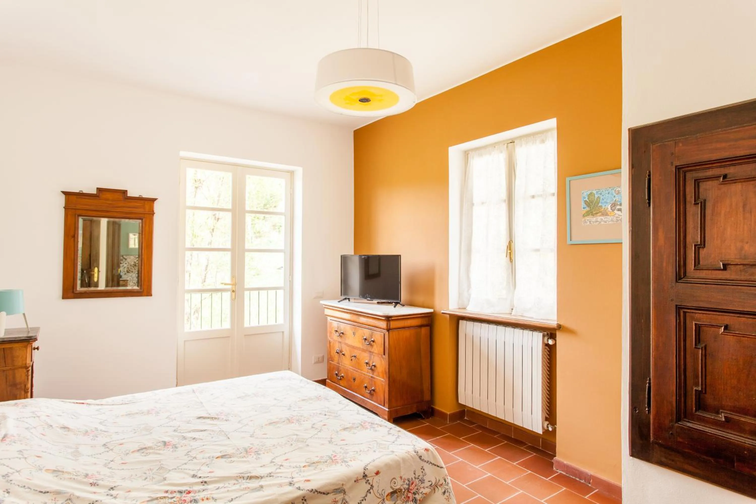 Bedroom in AMERICA NEI BOSCHI B&B