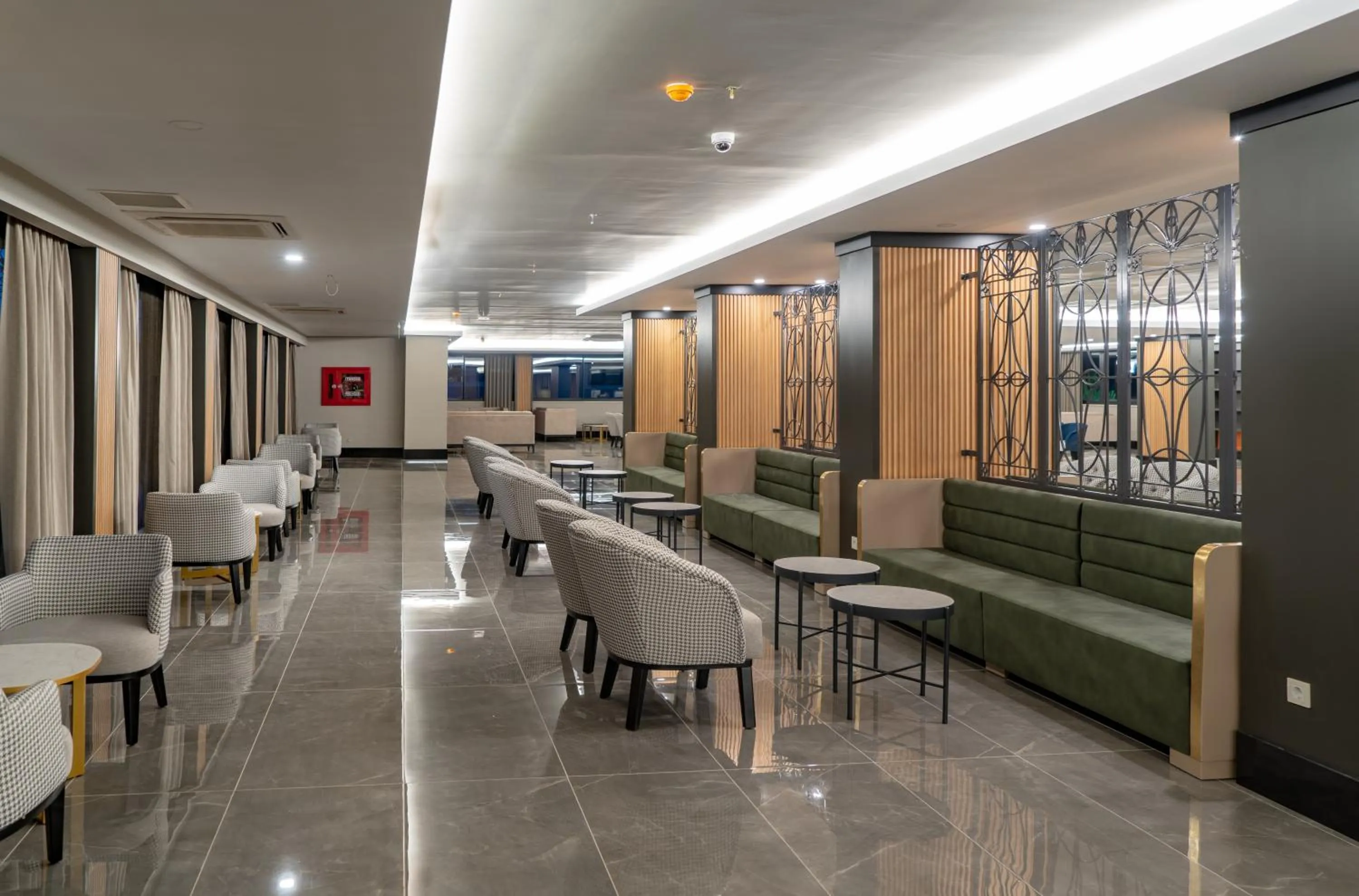 Seating area in Master Family Club