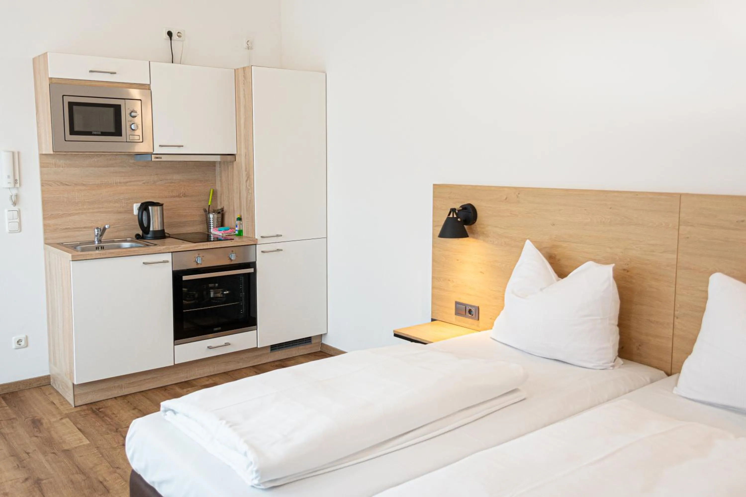 Kitchen or kitchenette, Bed in LA serviced apartments