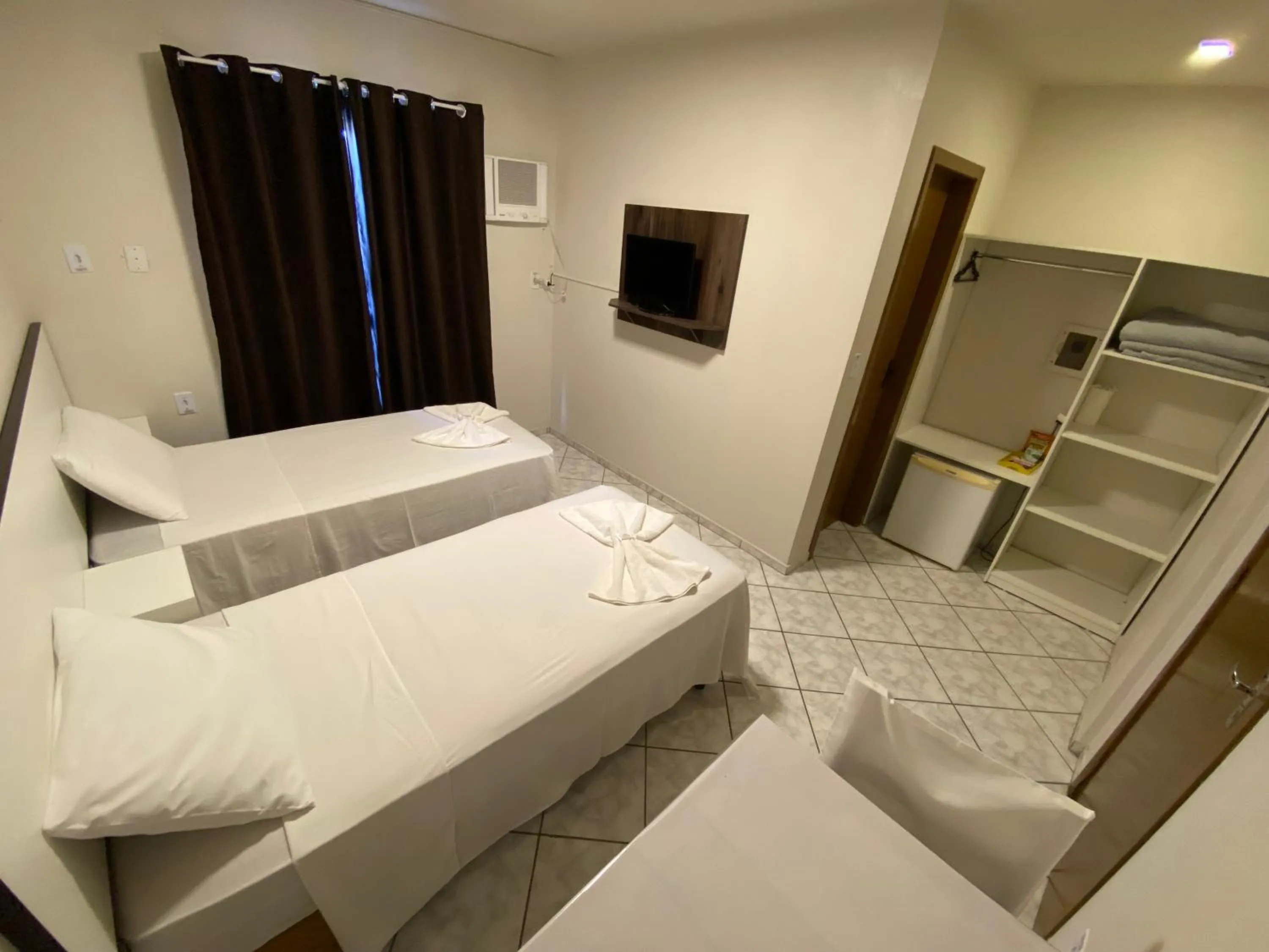 Bed in Pousada Cores