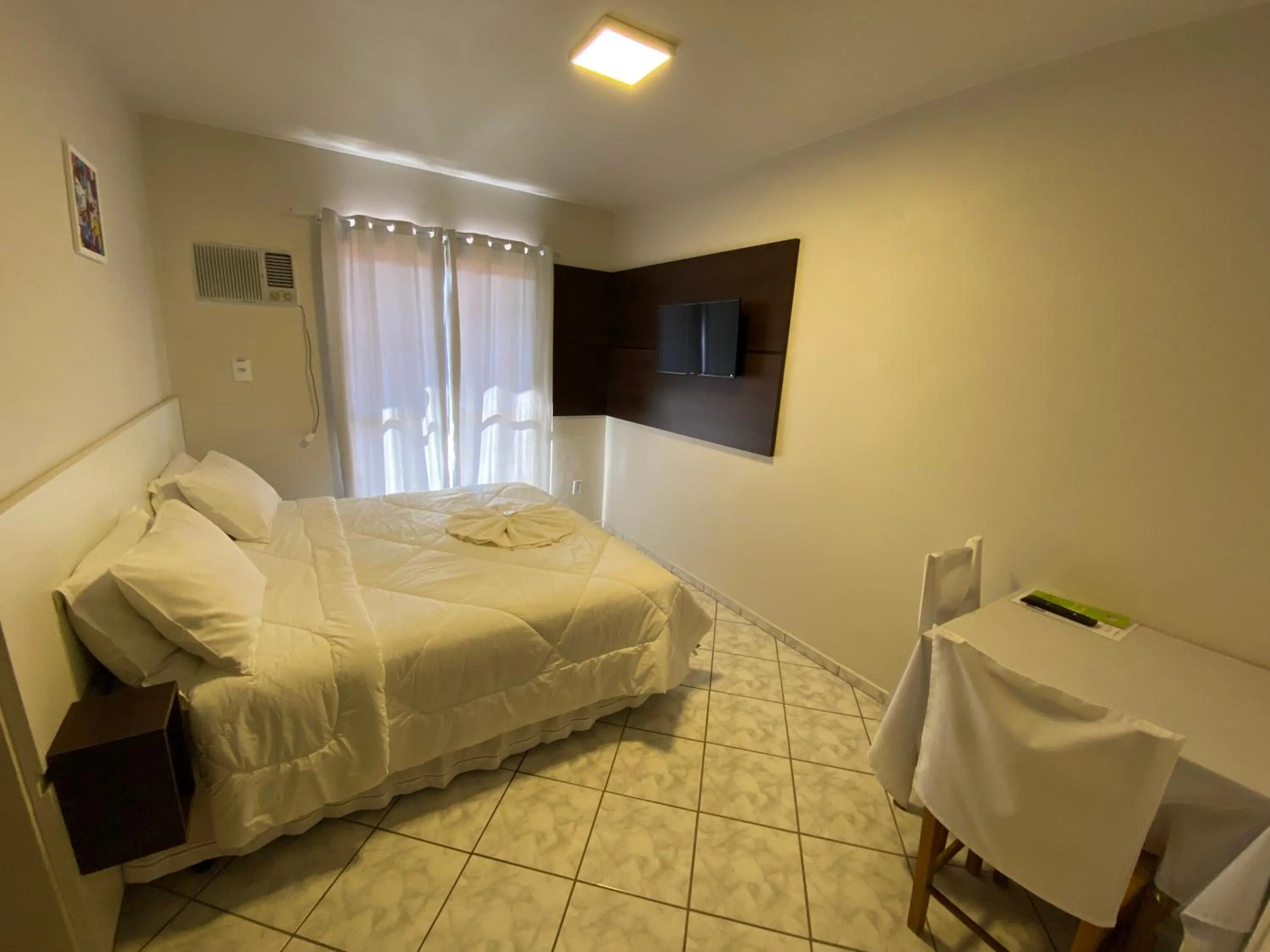 Bed in Pousada Cores