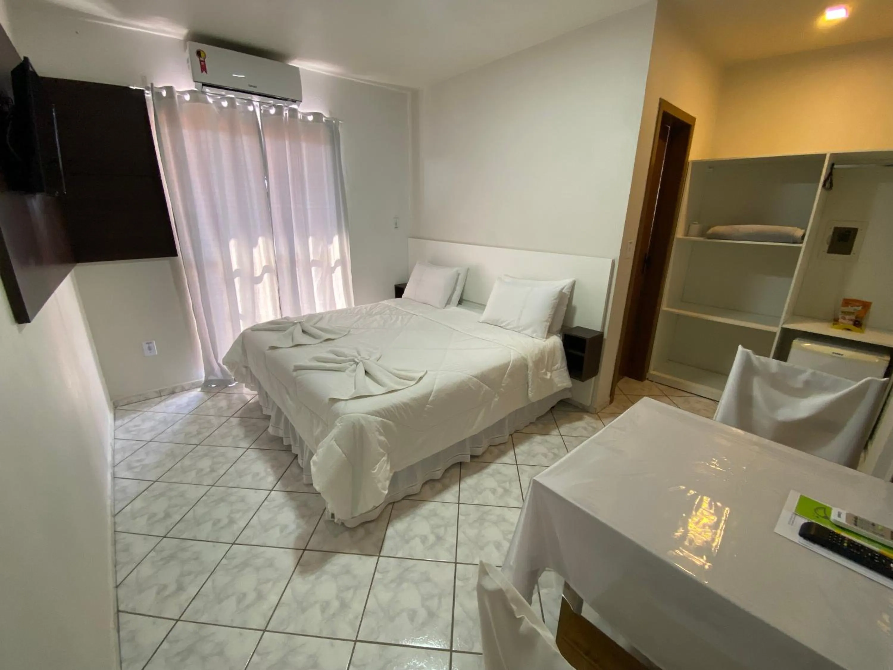 Bed in Pousada Cores