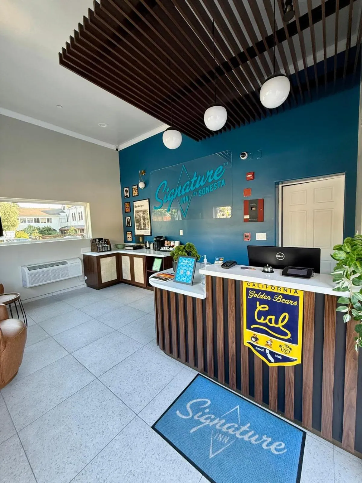 Property logo or sign in Signature Inn Berkeley