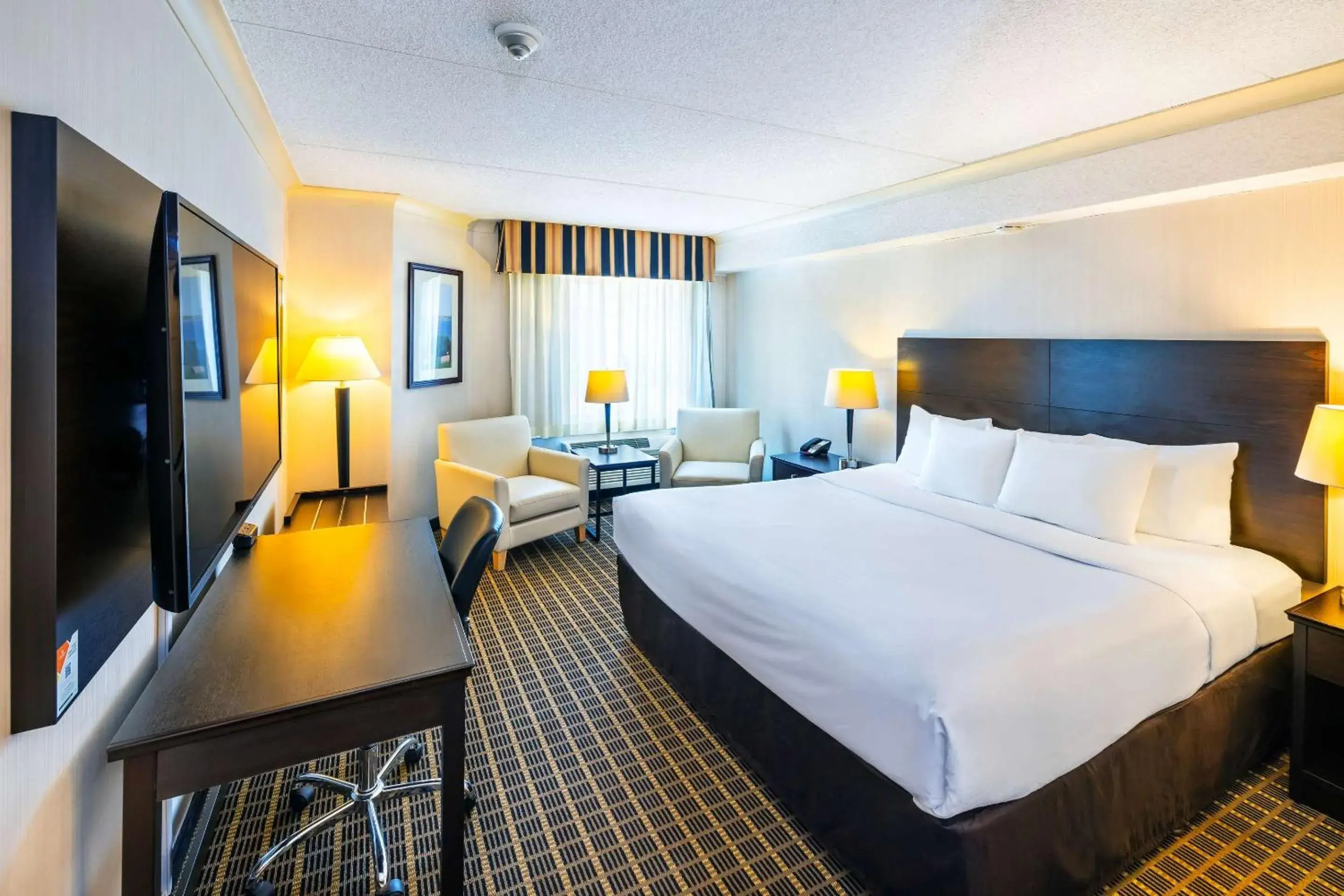 Standard King Room - Non-Smoking in Quality Inn & Suites Garden of the Gulf Standard King Room - Non-Smoking in Quality Inn & Suites Garden of the Gulf