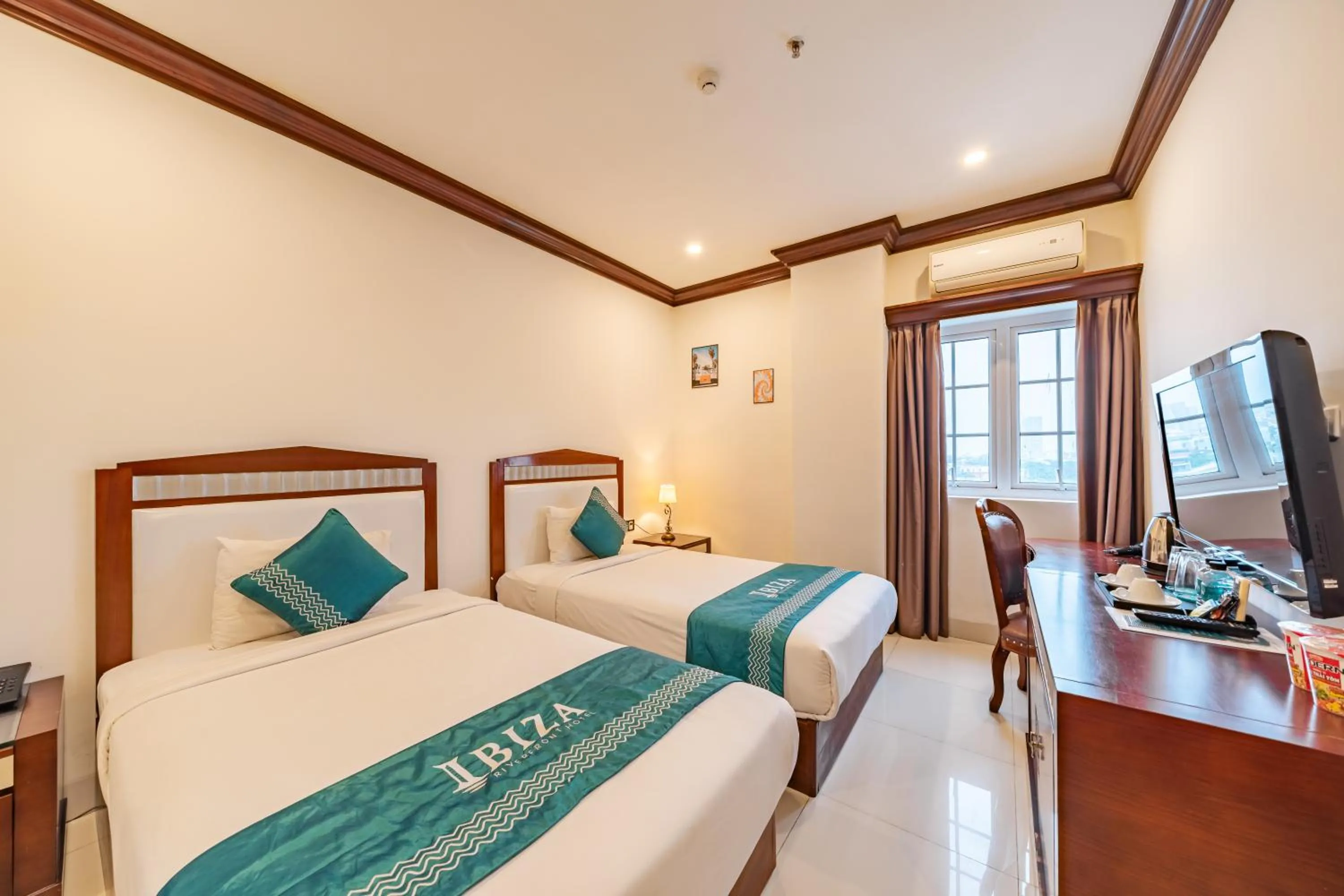 Bed in IBIZA Riverfront Da Nang Hotel