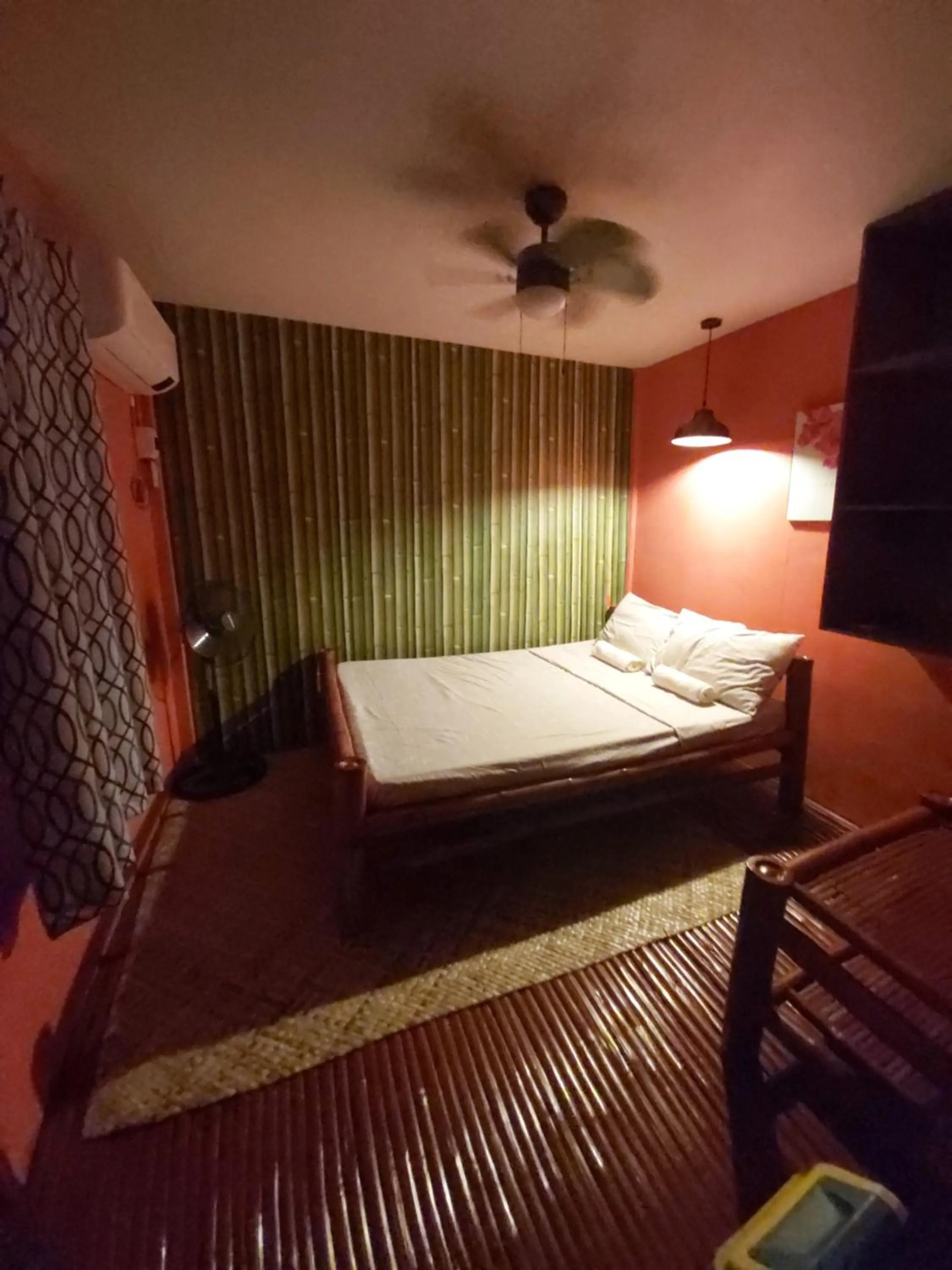 Bed in Anda Poseidon’s Beach Resort