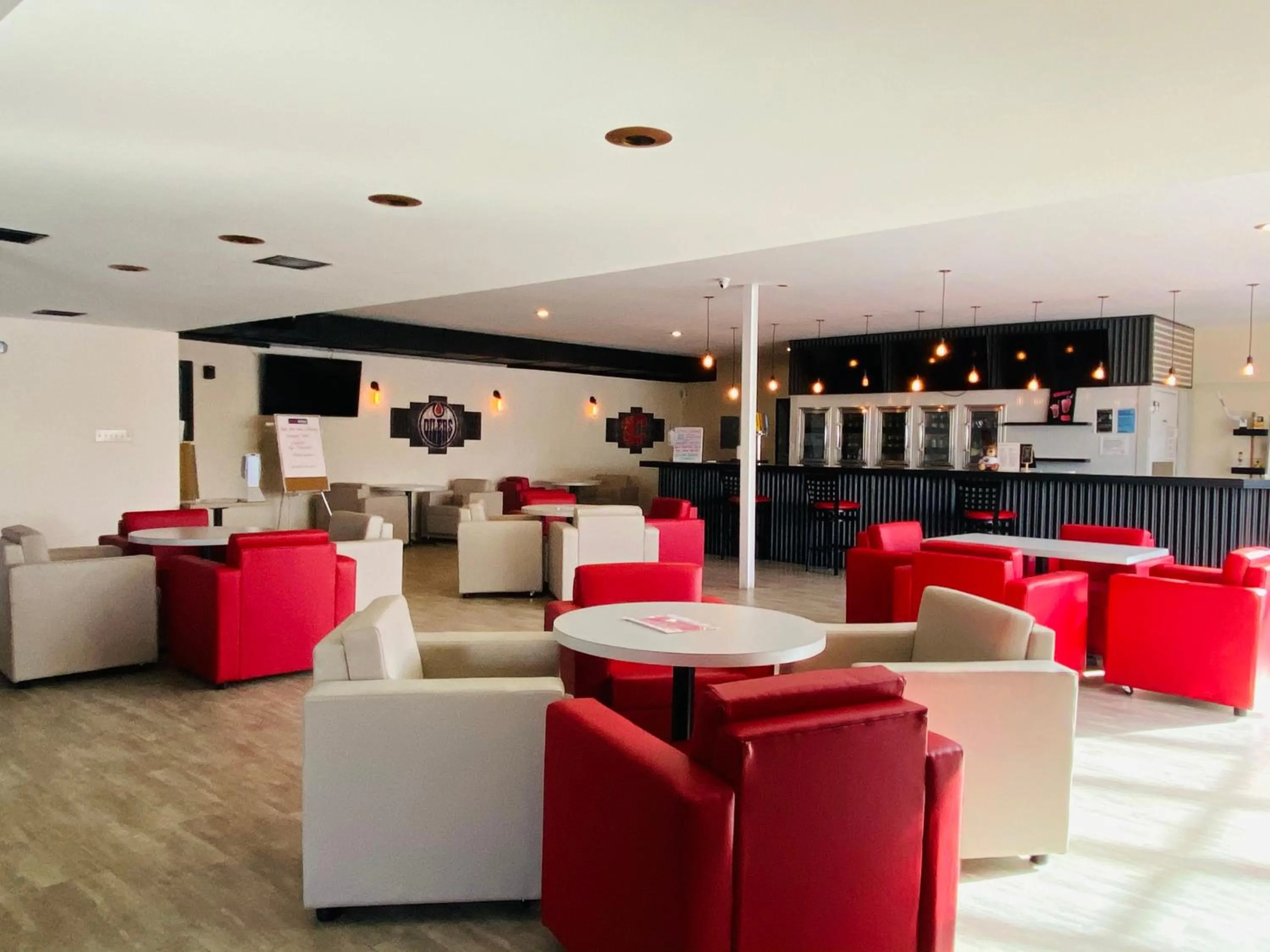Lounge or bar in Ramada by Wyndham Whitecourt