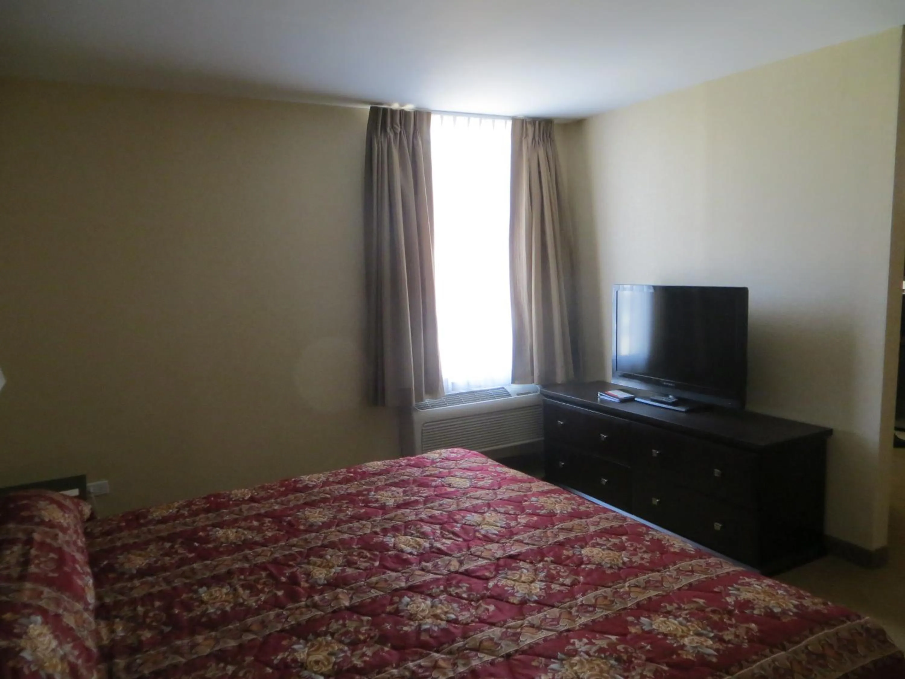 Bed, TV/Entertainment Center in New Lodge Winnipeg