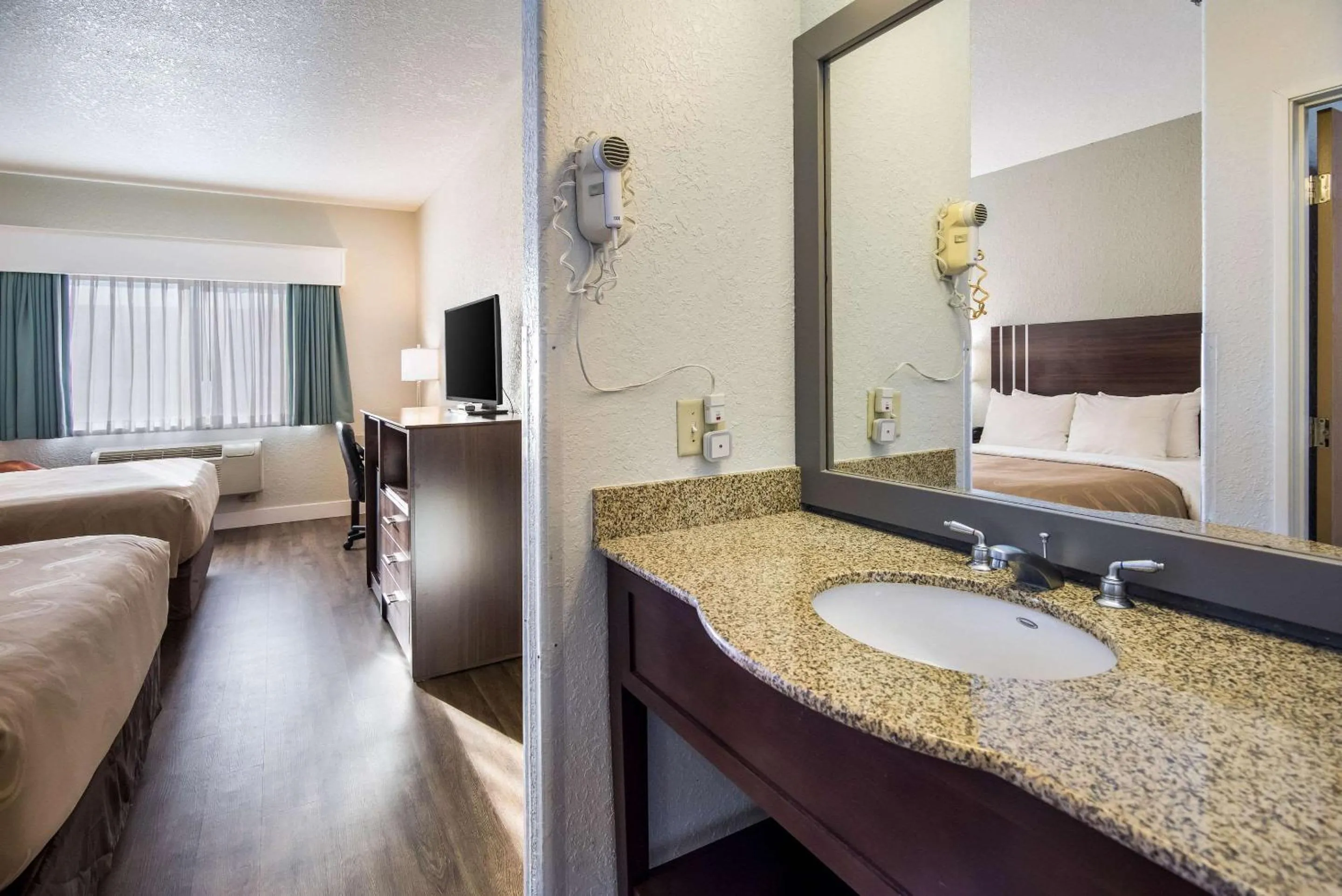 Bathroom, Bed in Quality Inn & Suites Pueblo West