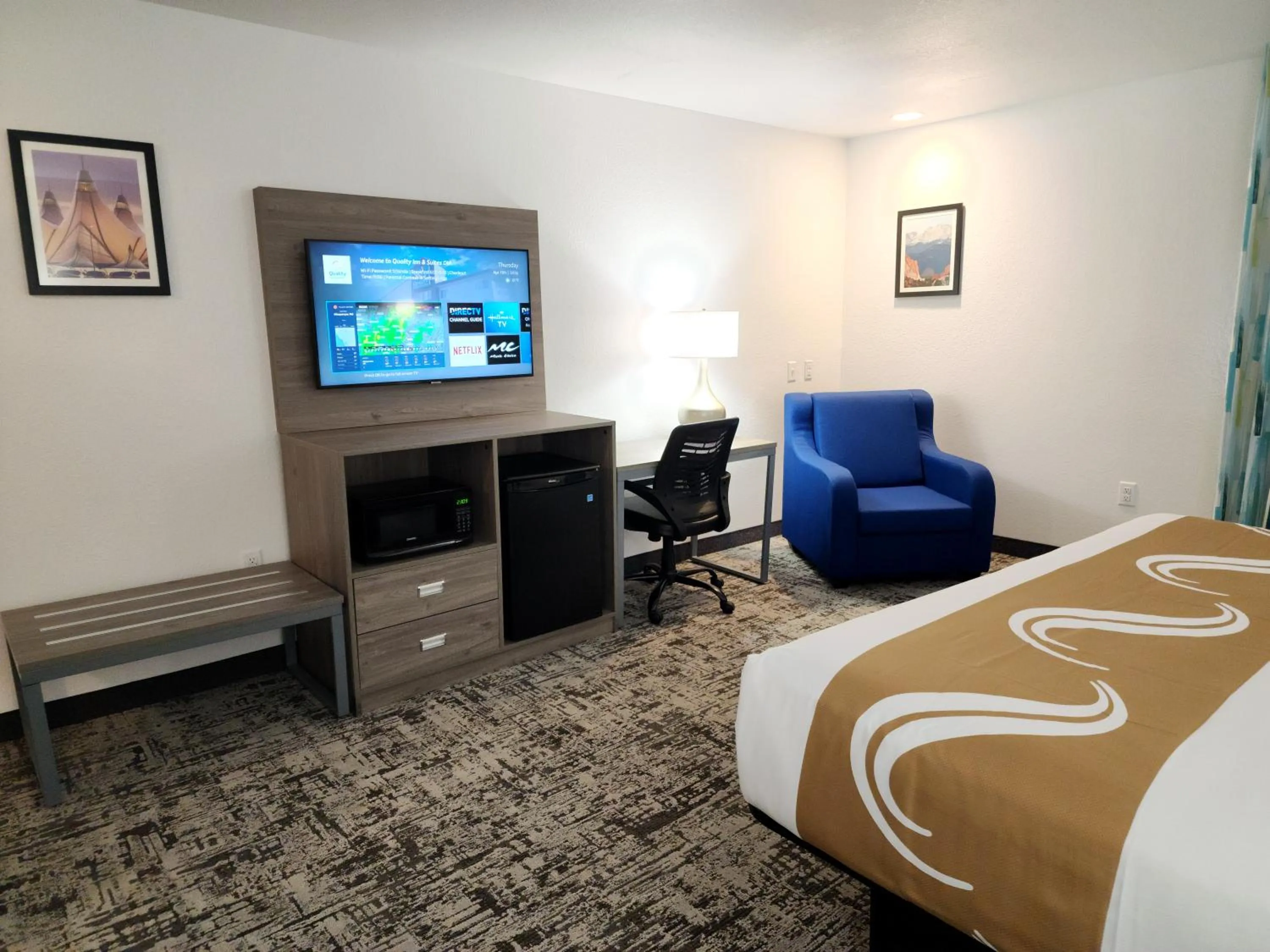 Bed in Quality Inn & Suites Denver International Airport