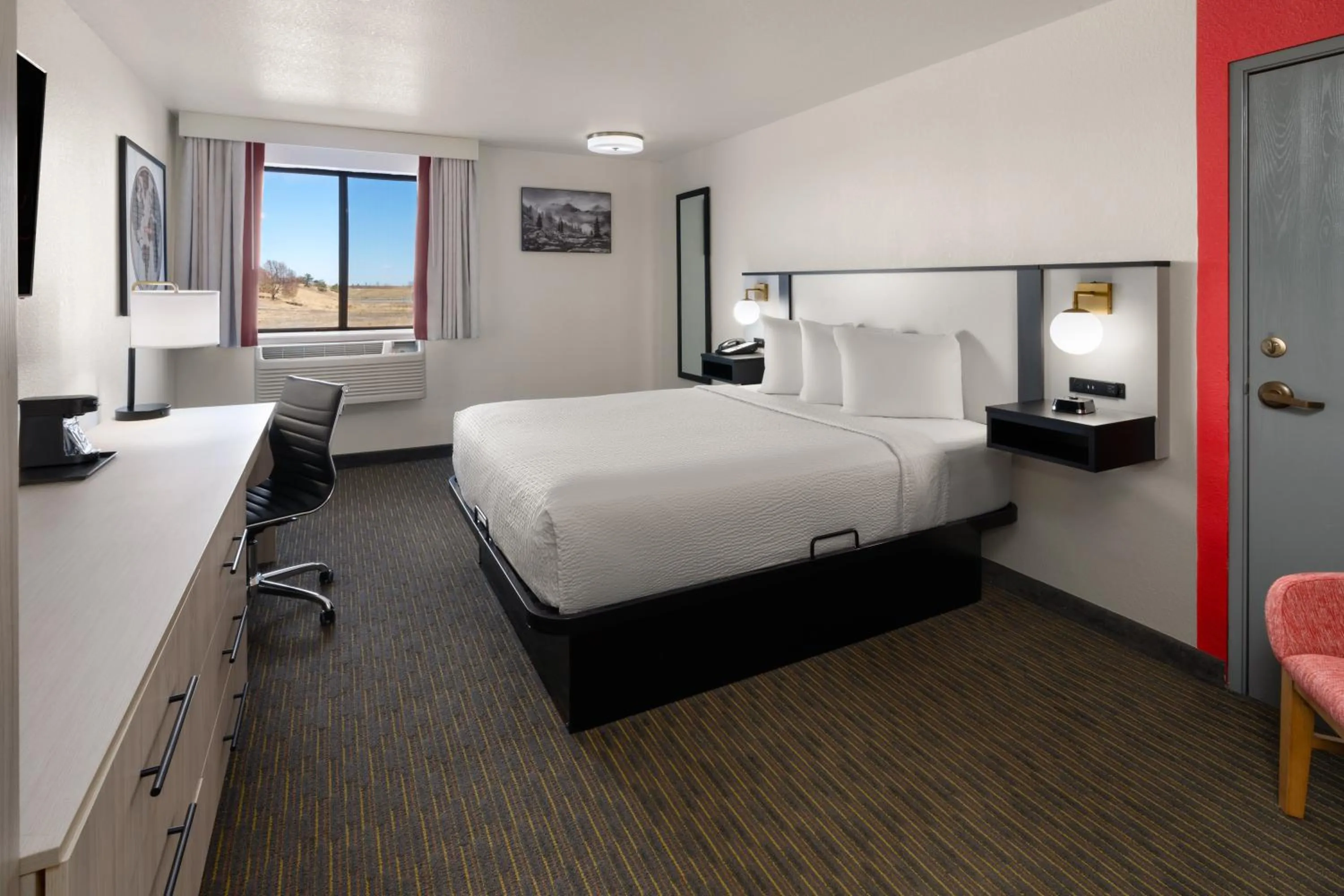 Bed in SYLO Hotel Denver Airport, a Ramada by Wyndham