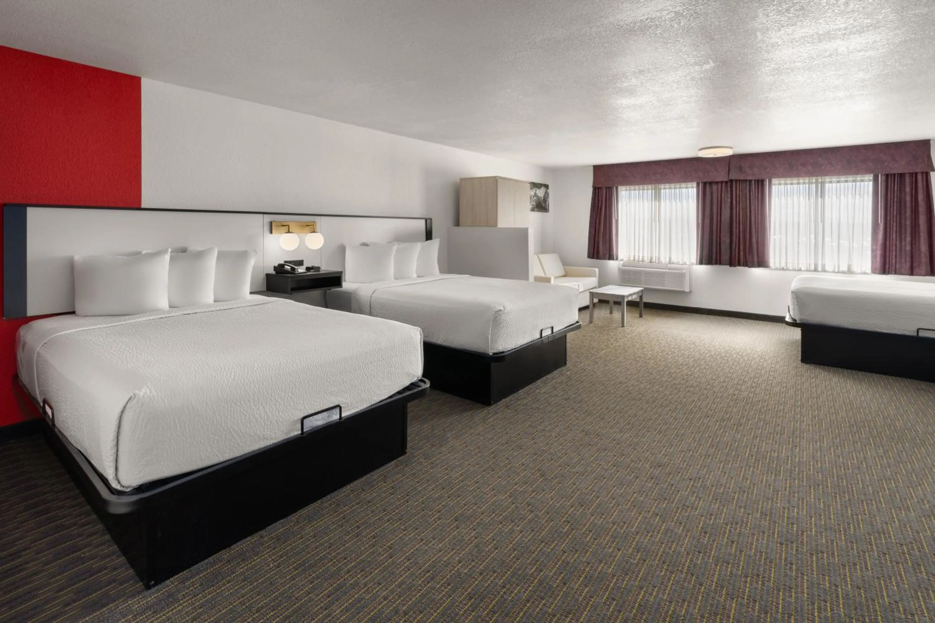 Bed in SYLO Hotel Denver Airport, a Ramada by Wyndham
