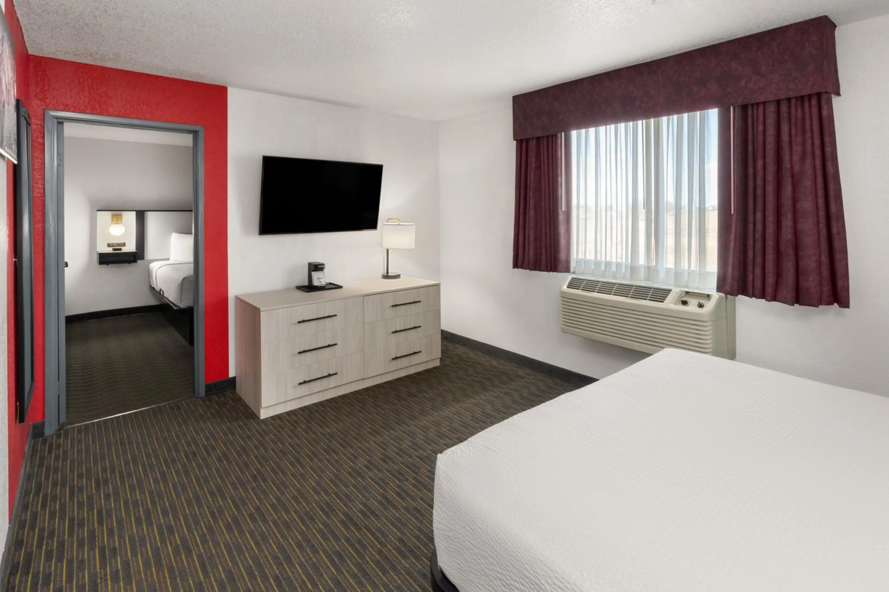 Bed in SYLO Hotel Denver Airport, a Ramada by Wyndham