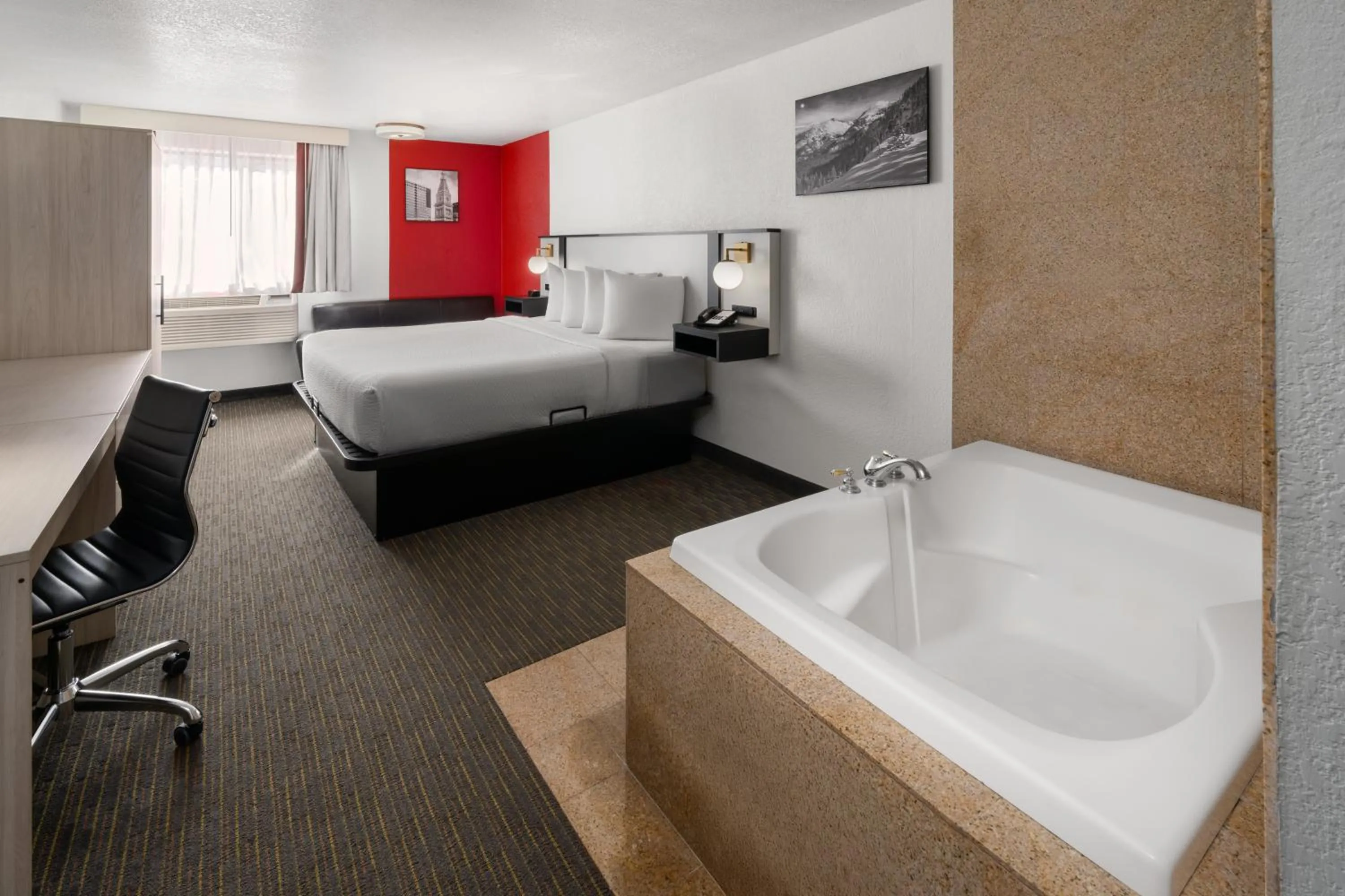 Bed in SYLO Hotel Denver Airport, a Ramada by Wyndham